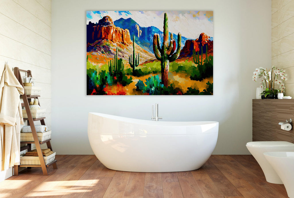 a bathroom with a large painting of a desert landscape hanging on the wall above a freestanding bathtub.