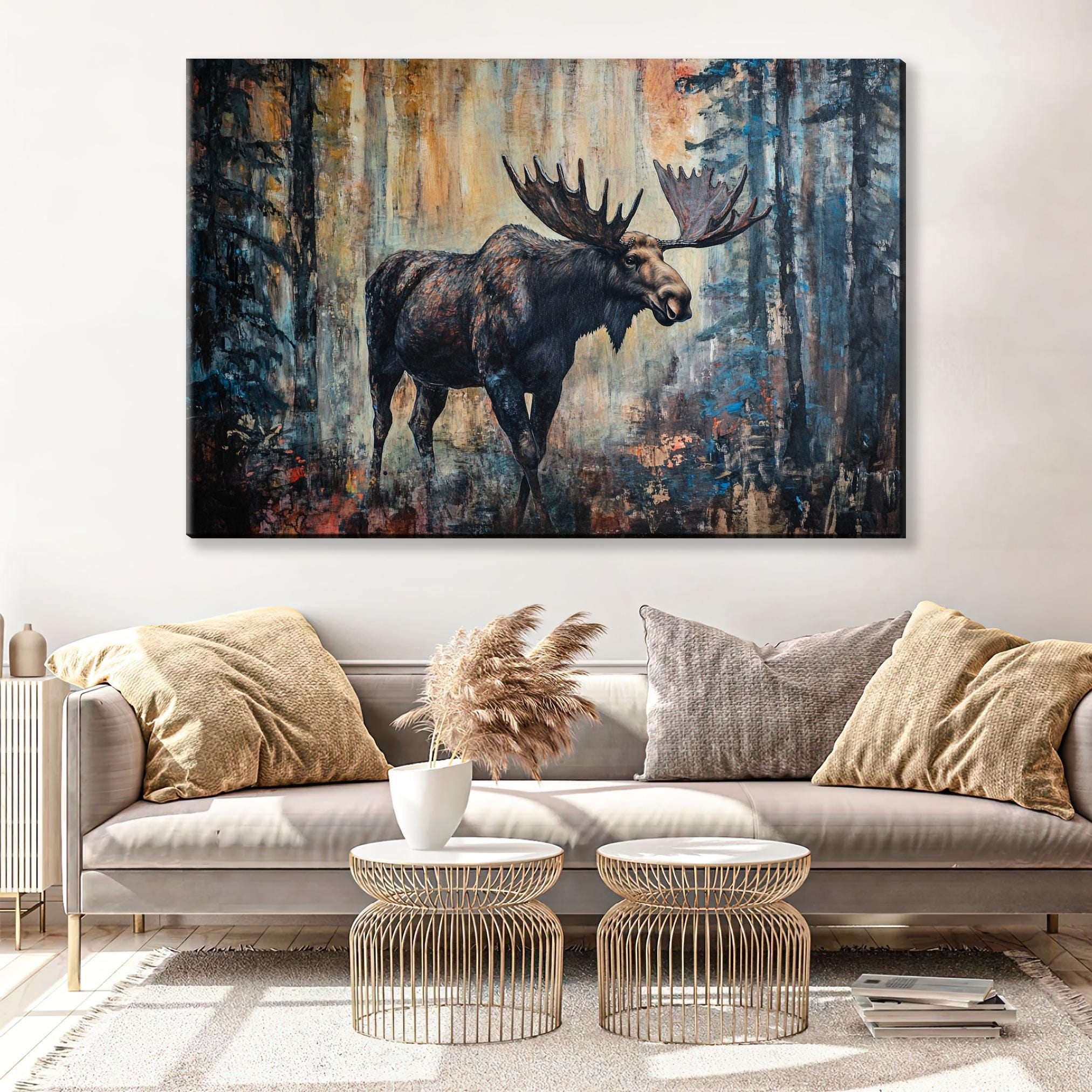 a living room with a couch and a painting of a moose