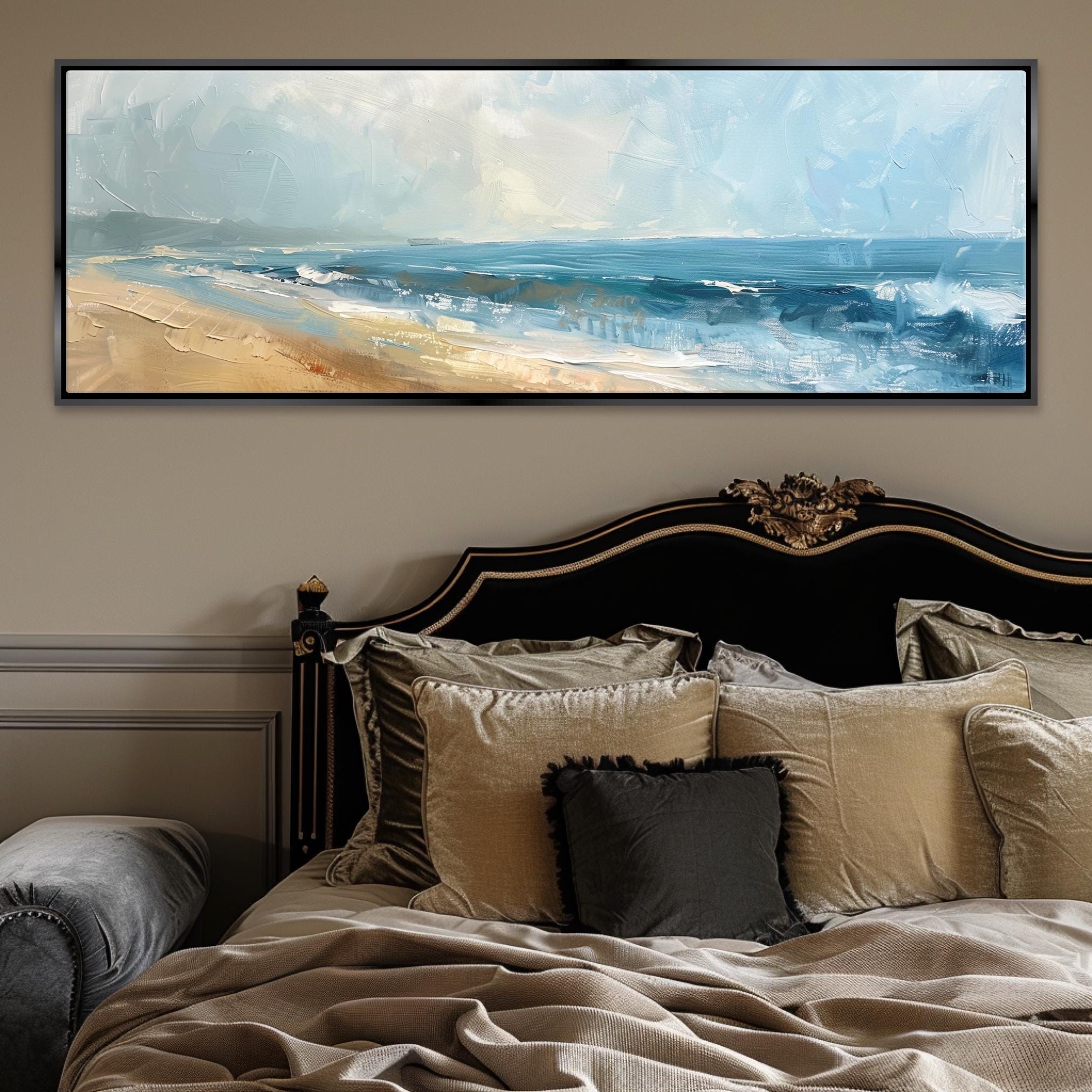 a bed with a painting on the wall above it