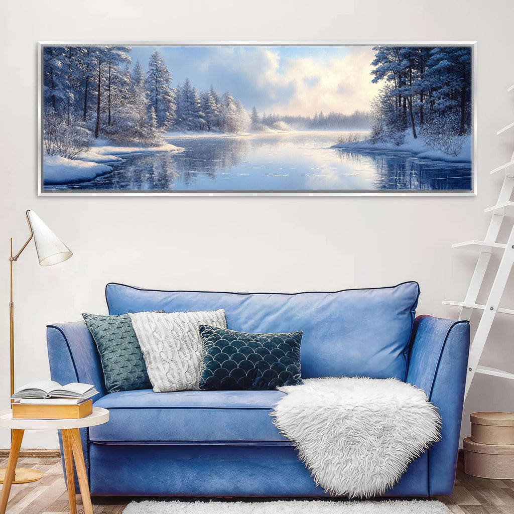 a living room with a blue couch and a painting on the wall