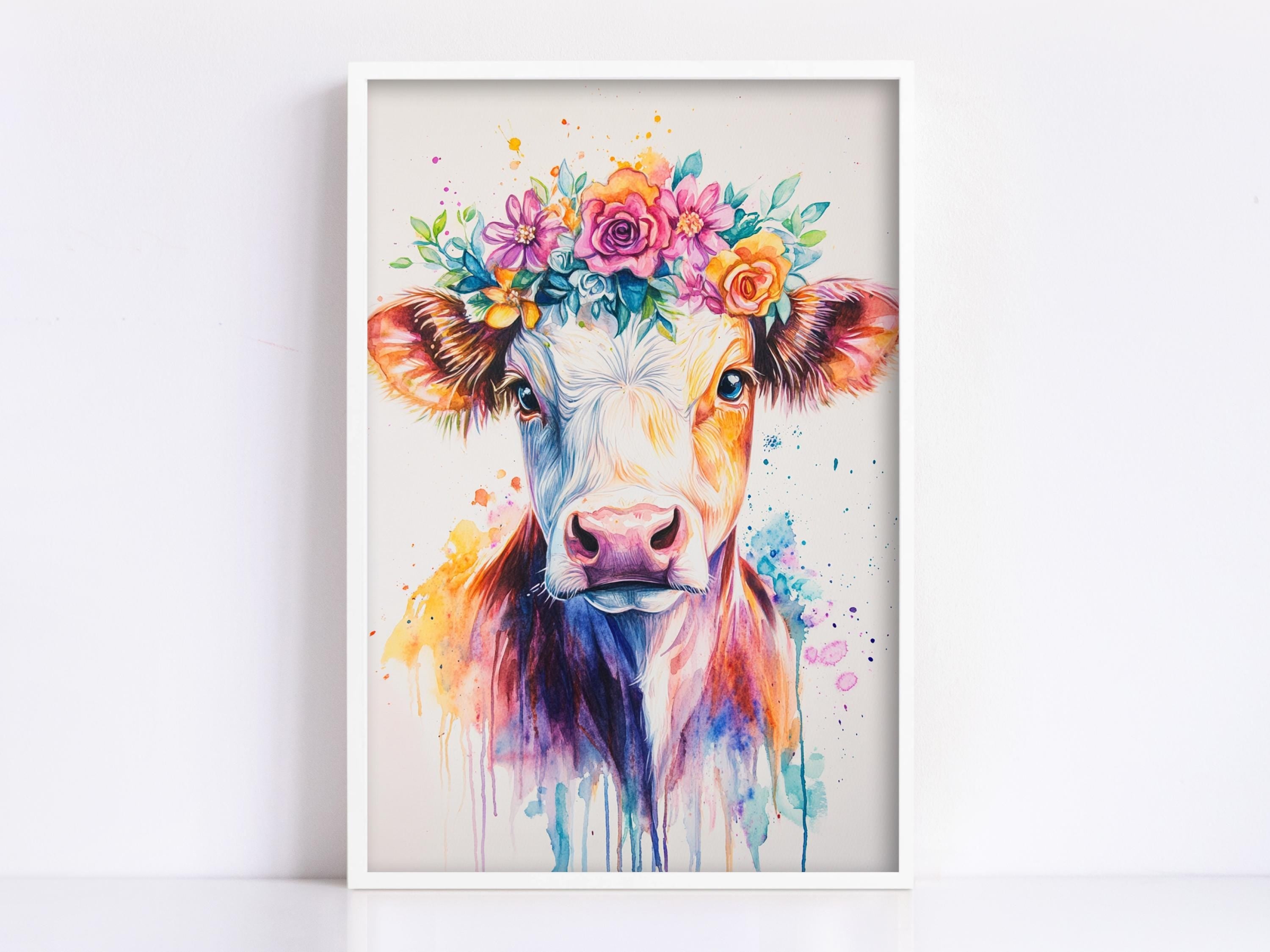 A framed painting depicting a cow with a colorful floral crown on its head.