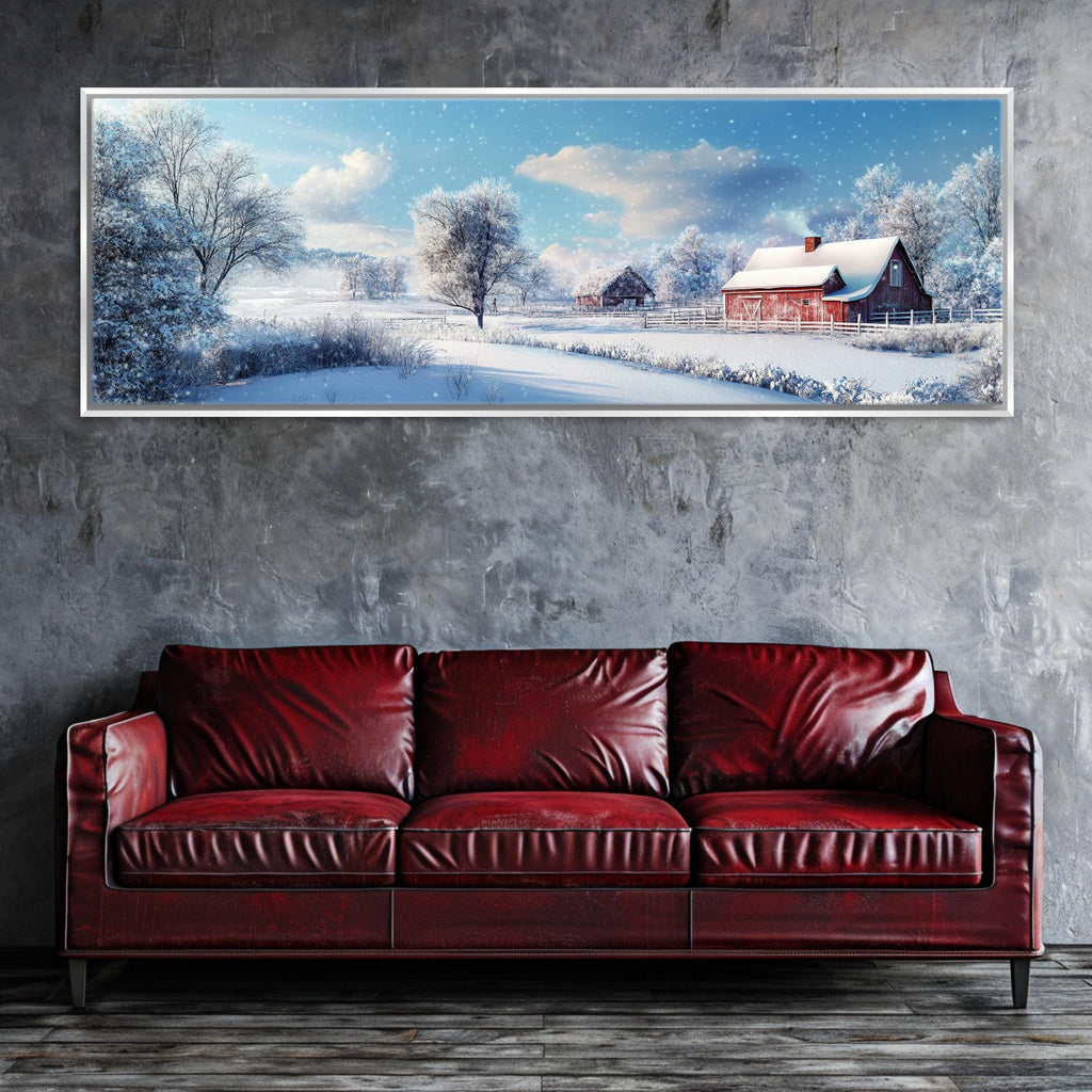 a red leather couch sitting in front of a painting on a wall