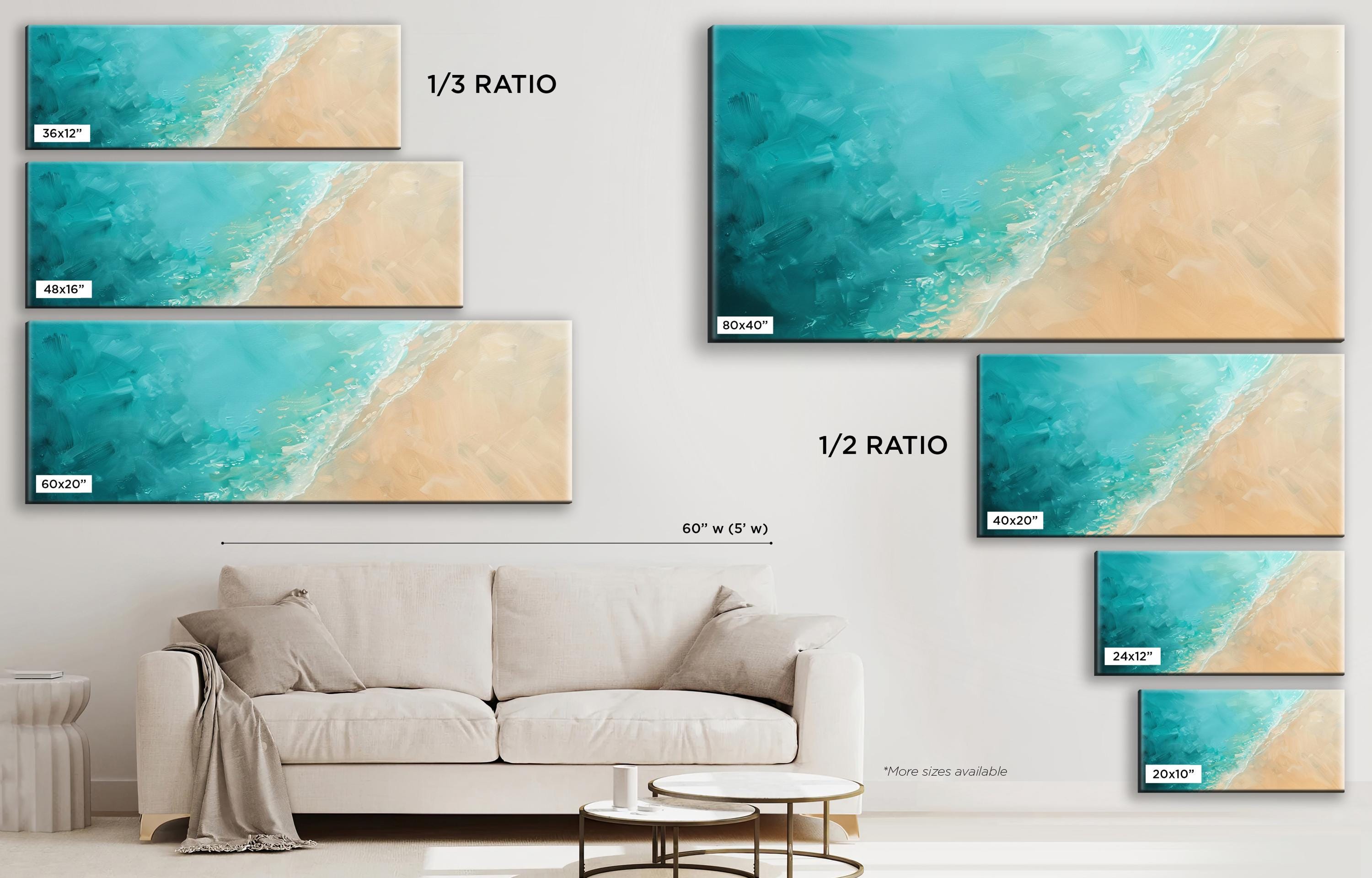 a living room with a couch and three paintings on the wall