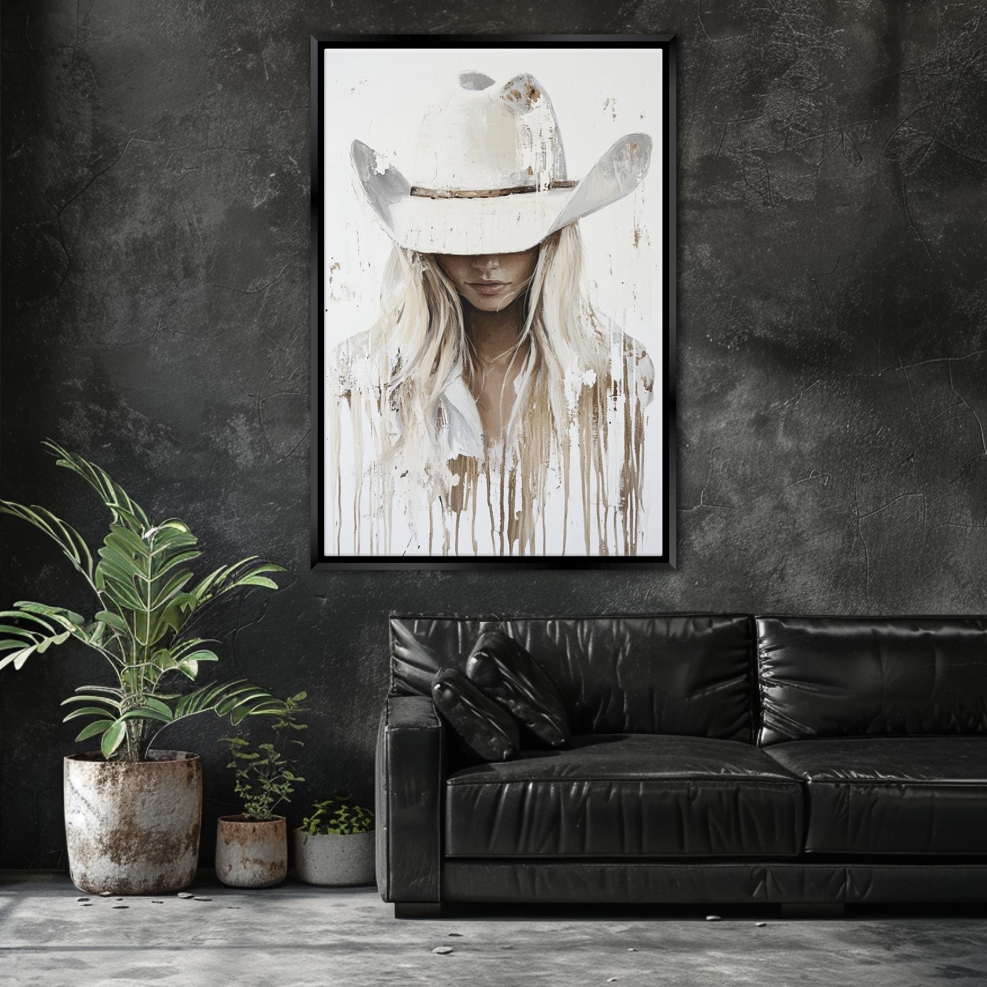 a living room with a couch and a painting on the wall