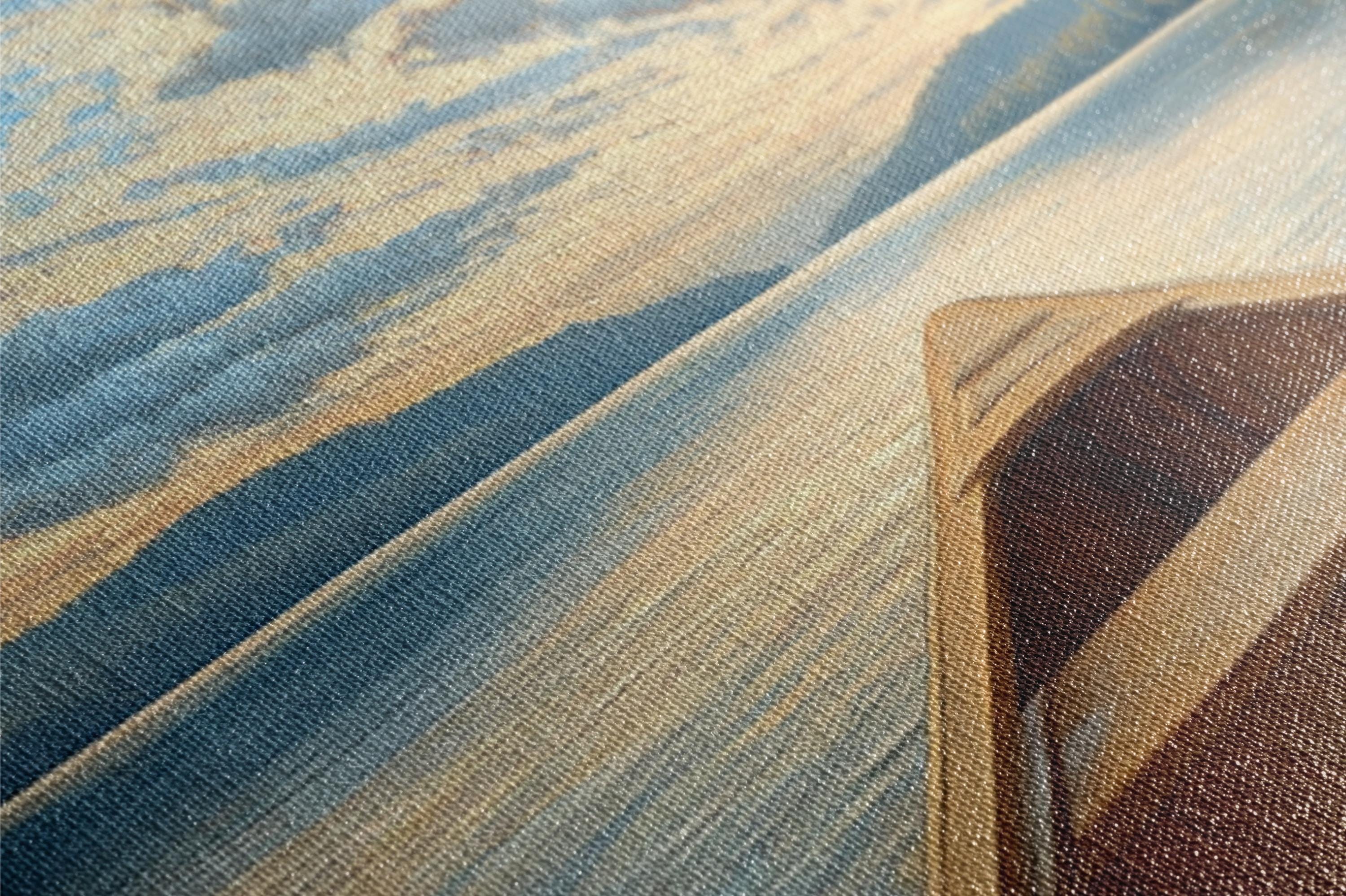 a close up of a rug with a blue and brown design