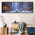 a picture of a snowy city street with cars