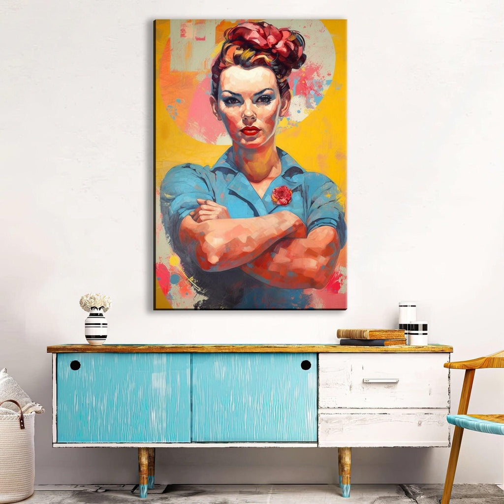 a large, colorful painting of a woman with a determined expression, hanging on a wall above a blue cabinet.