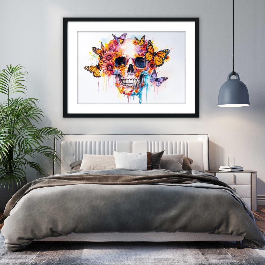 a bedroom with a large bed, a framed artwork of a colorful skull with butterflies hanging above it, and a potted plant to the left.