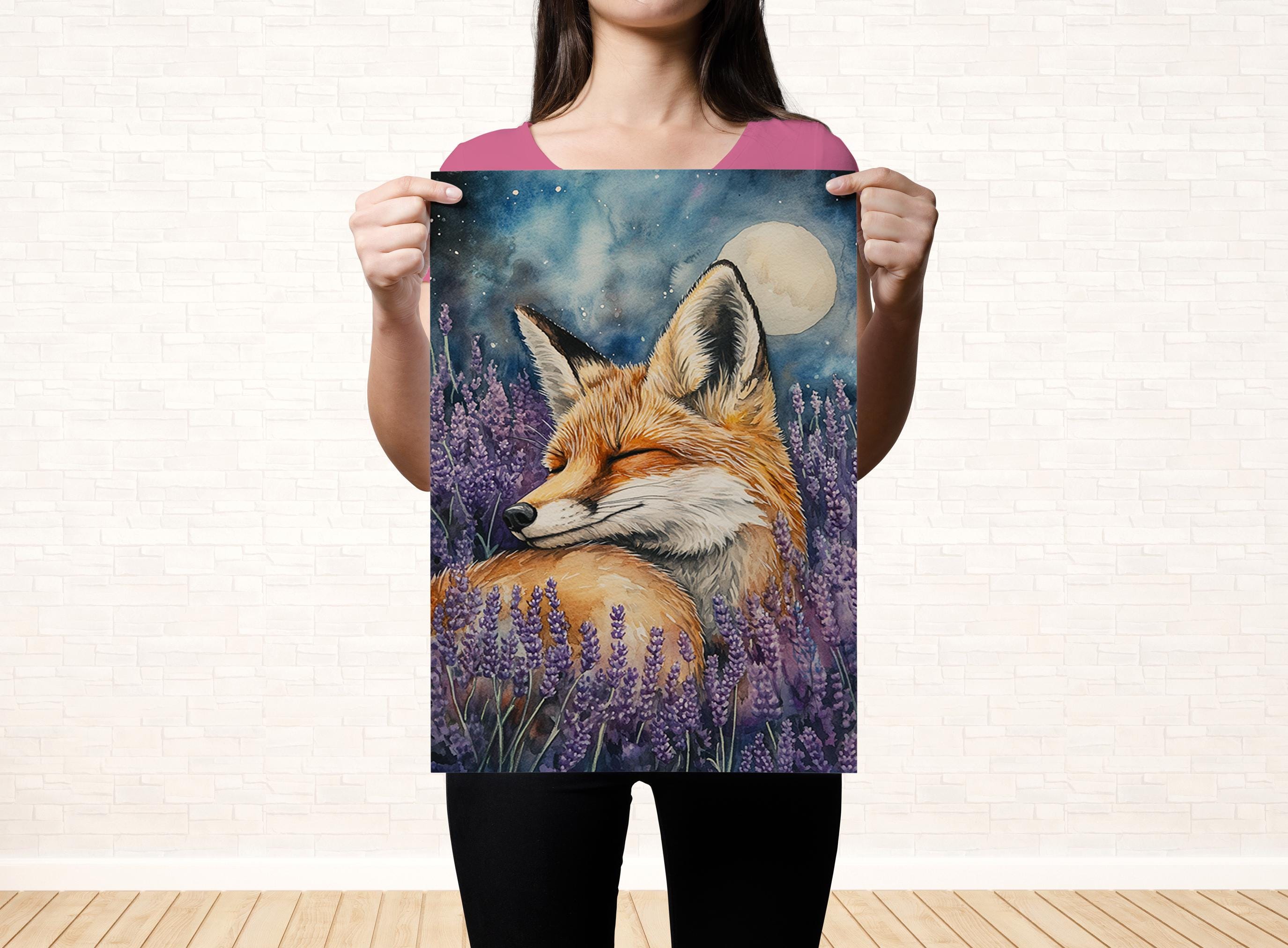 A woman holds up a framed painting of a fox in a field of purple flowers, with a full moon in the background.