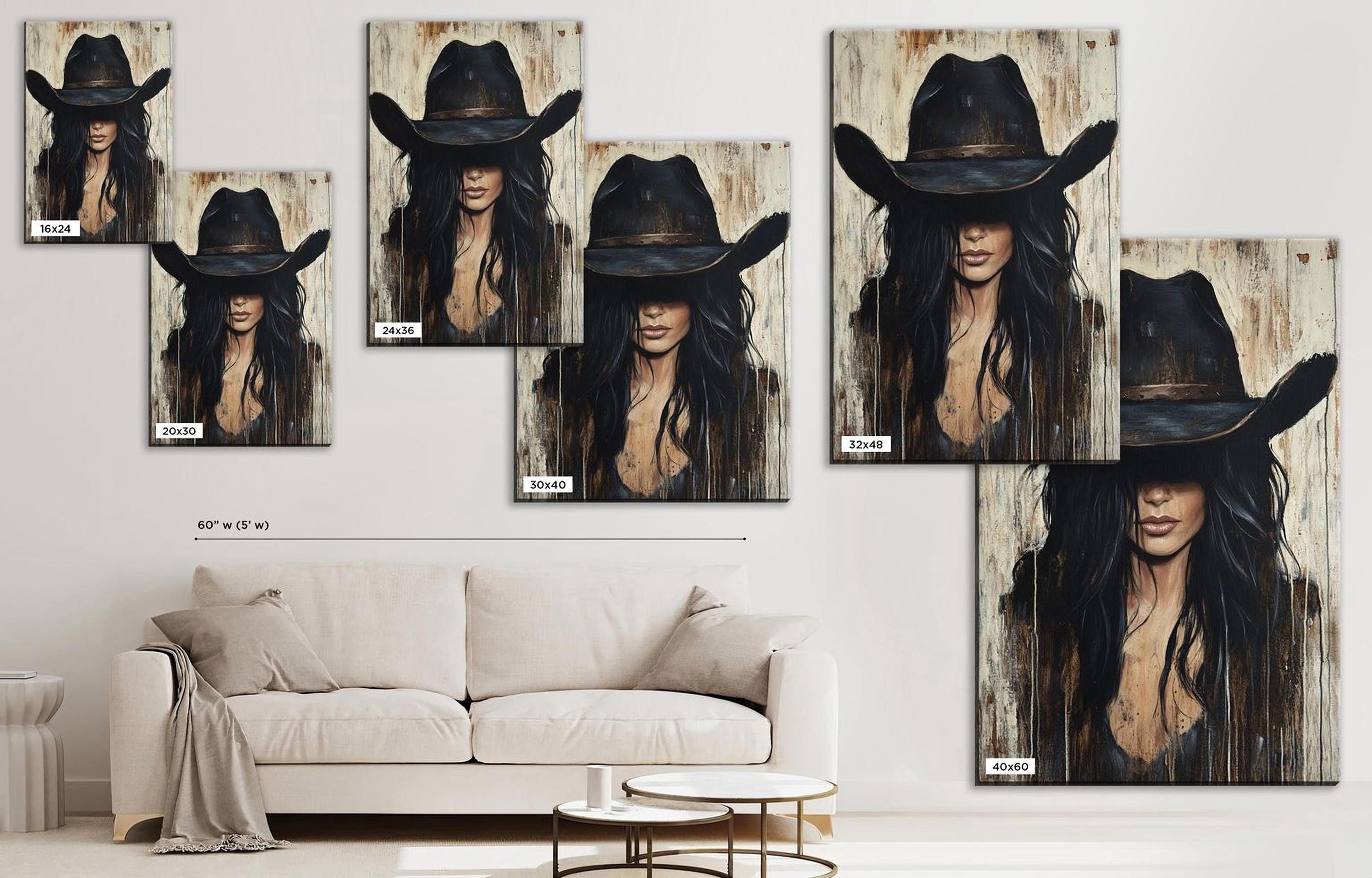 a living room with a couch and a painting of a woman wearing a cowboy hat