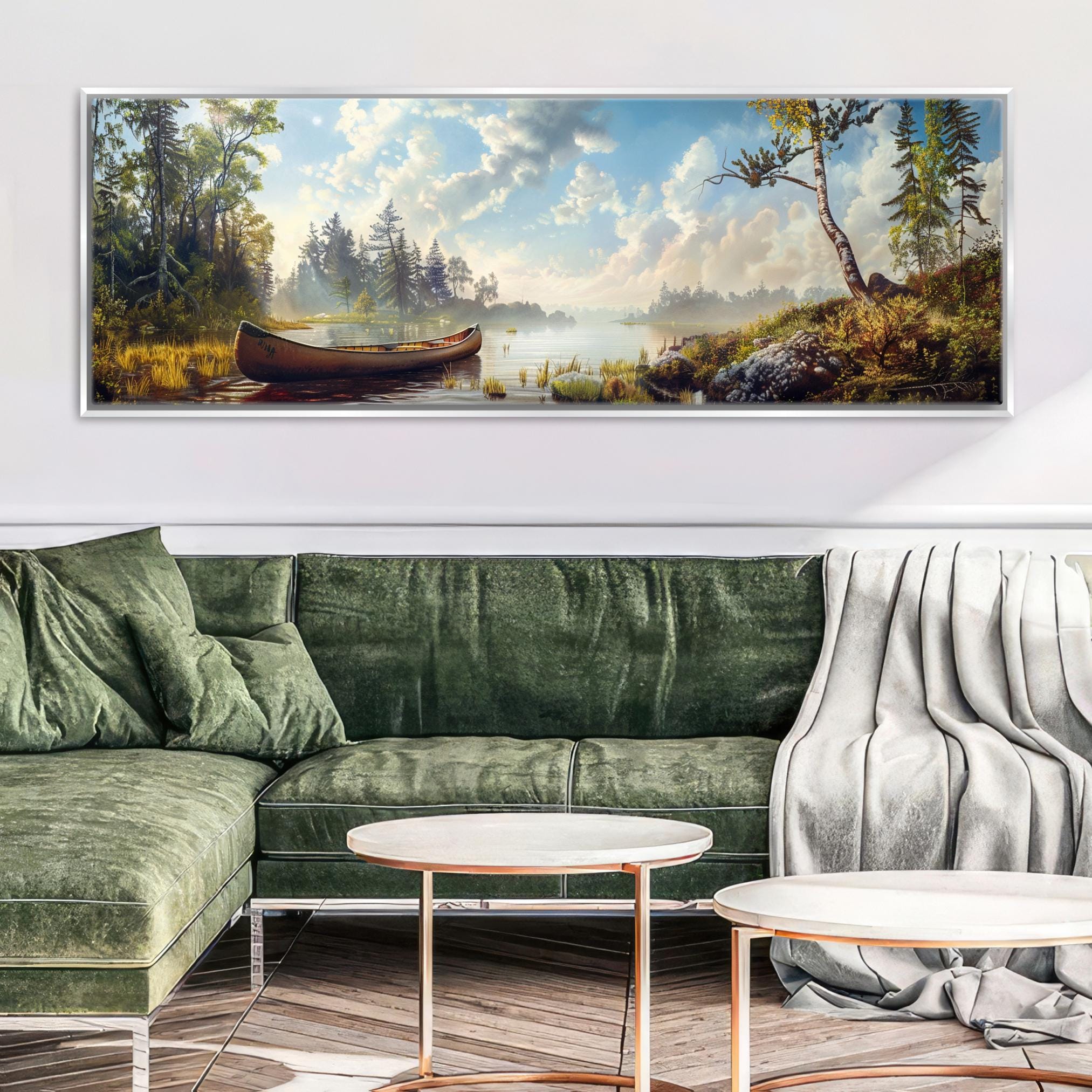 a living room with a green couch and a painting on the wall