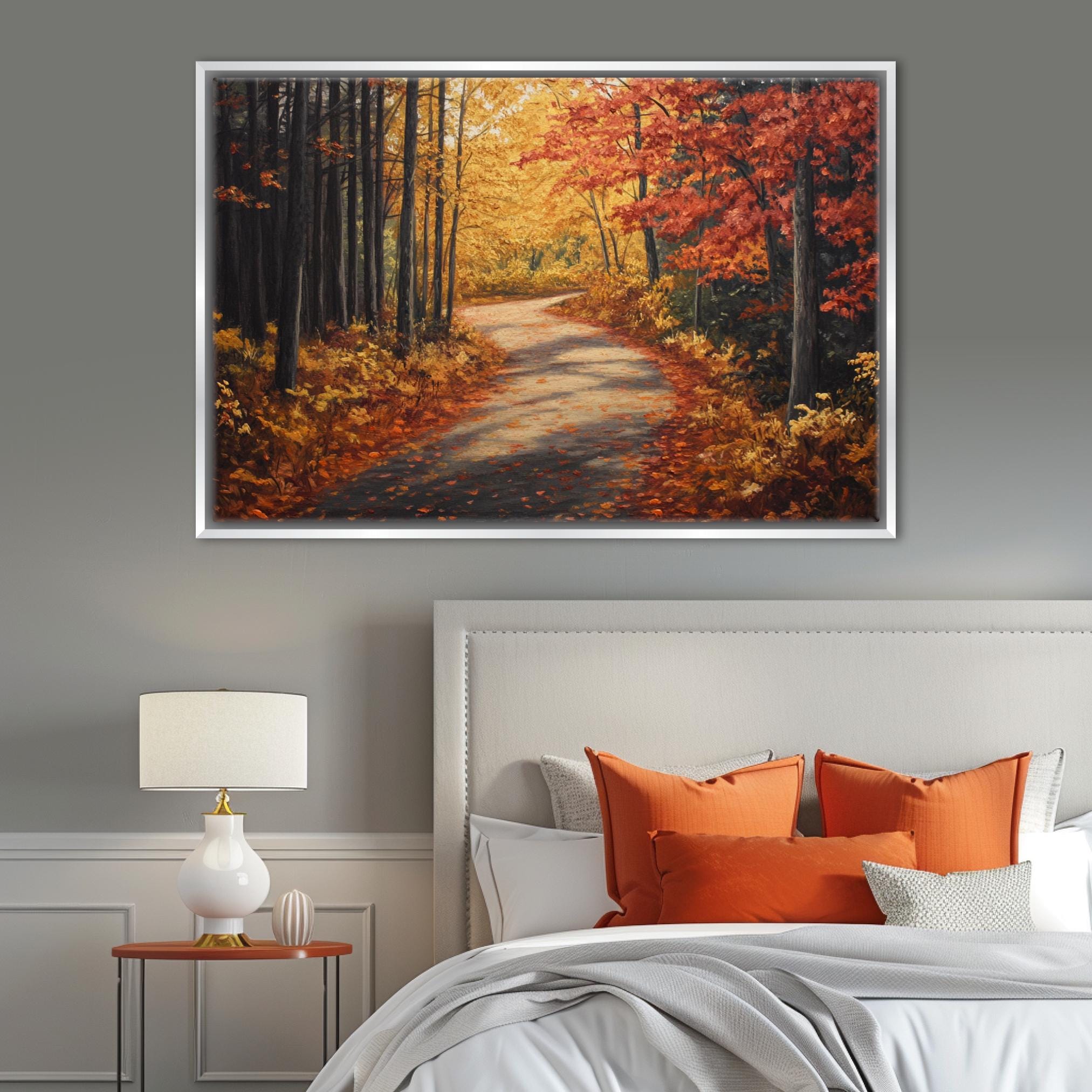 a serene autumn scene with a winding path surrounded by trees displaying vibrant orange and yellow leaves.