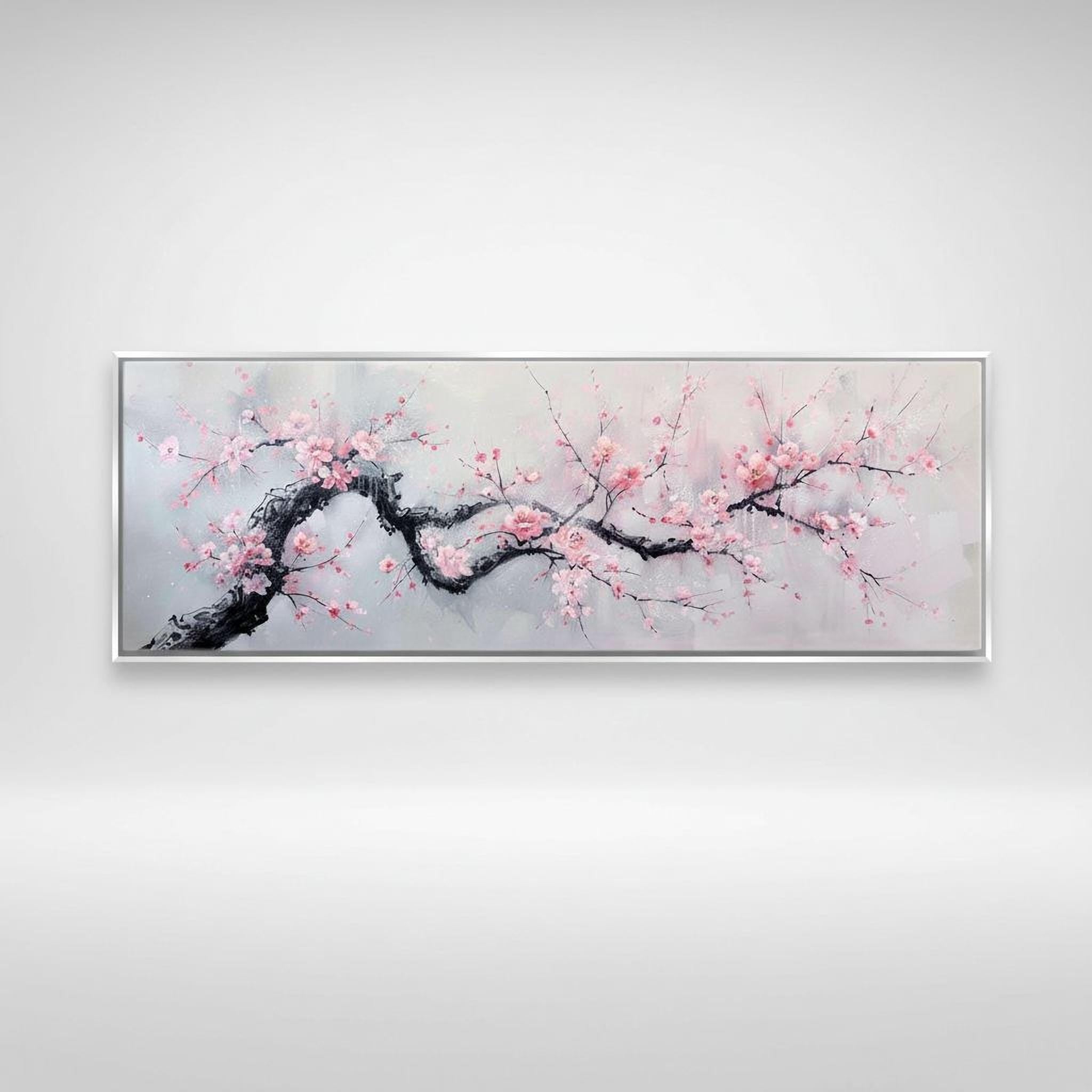A framed painting depicting a branch of pink flowers against a light gray background.