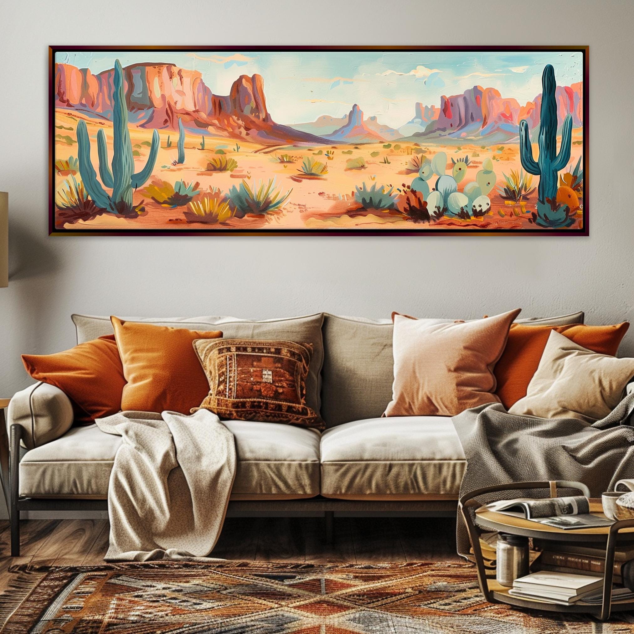 a living room with a couch and a painting on the wall