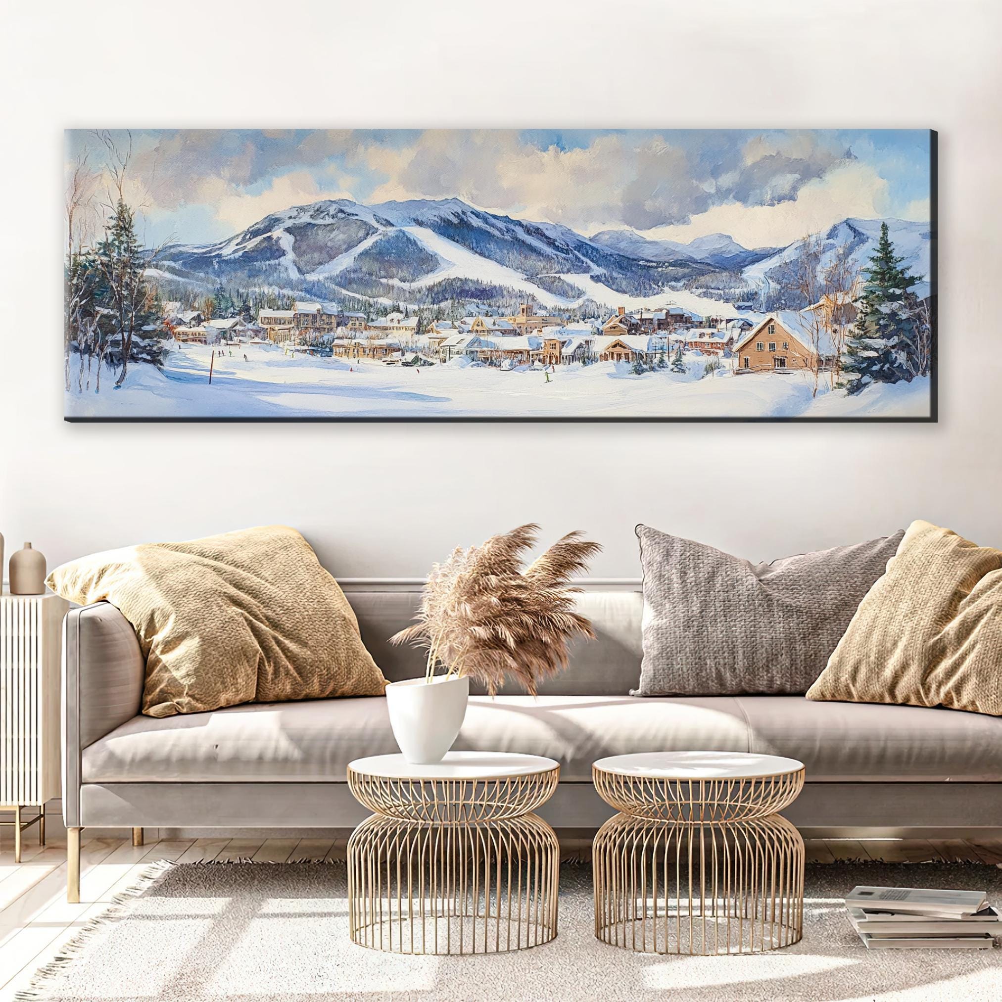 a living room with a couch and a painting on the wall