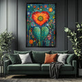 a living room with a green couch and a painting on the wall