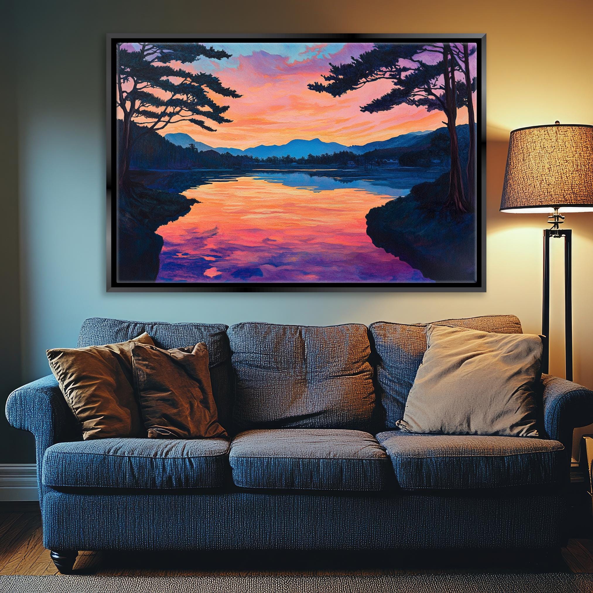 a living room with a couch and a painting on the wall