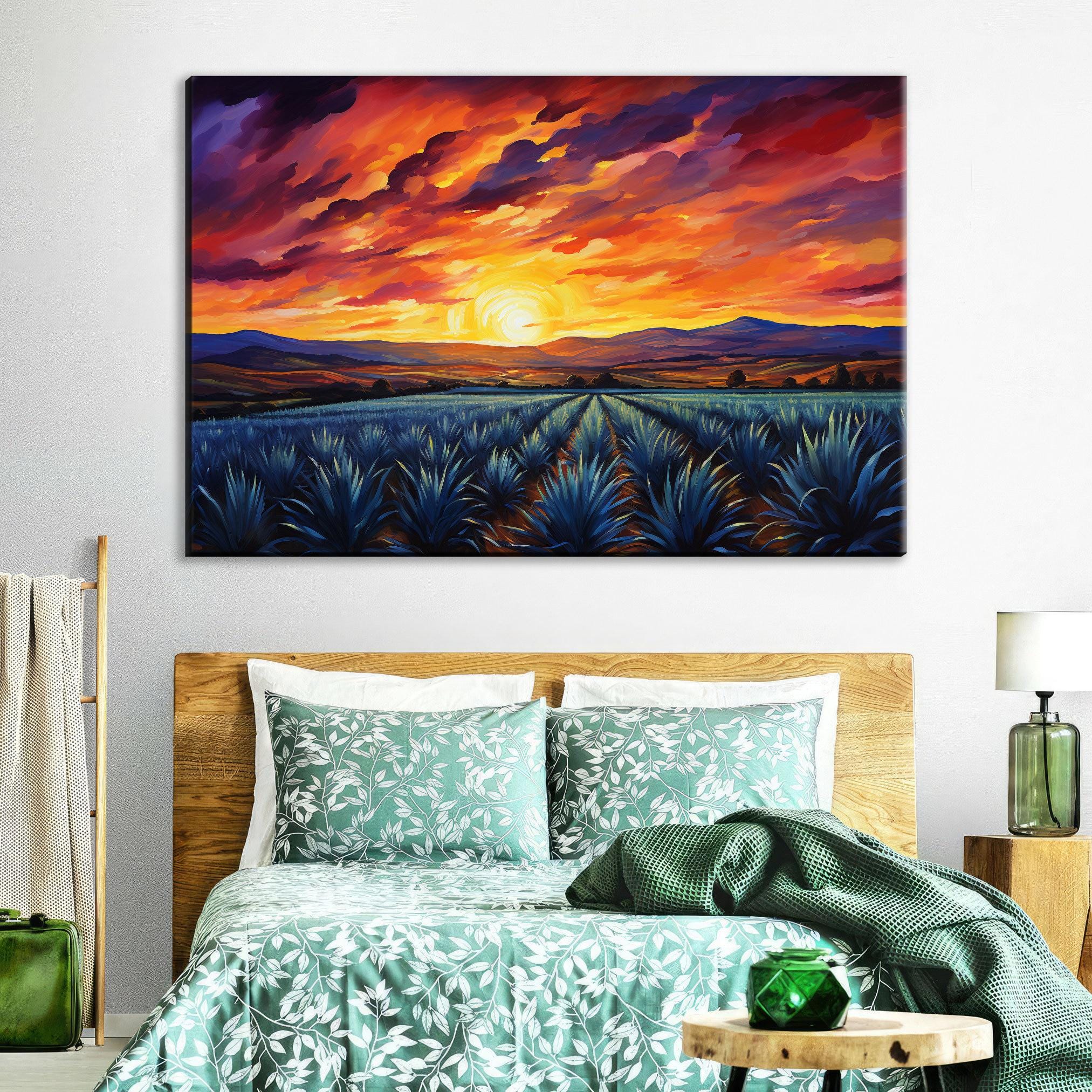 a serene bedroom scene with a large painting of a sunset over a field of blue flowers hanging on the wall above a bed with a green and white floral bedspread.