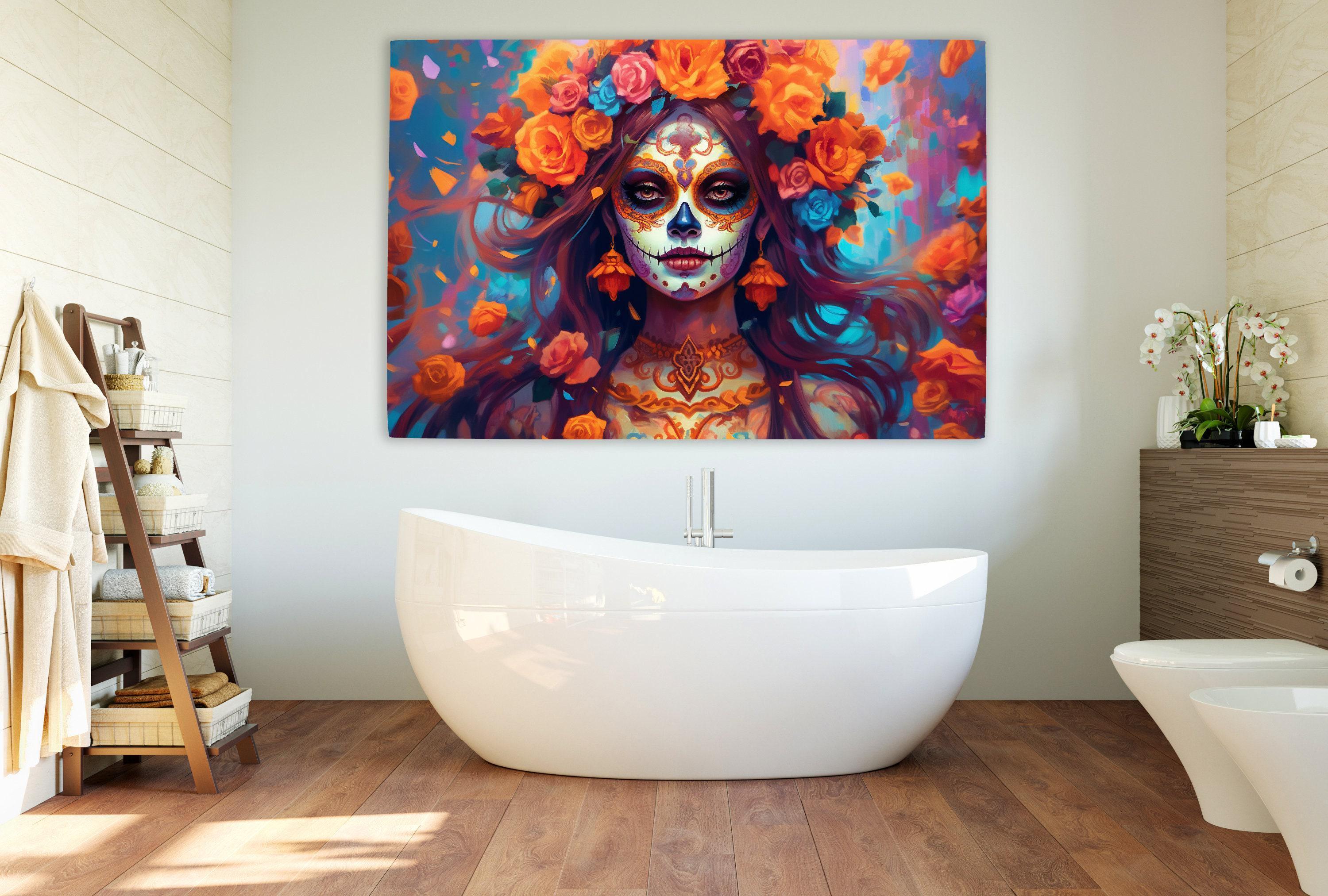 a large, colorful painting of a woman with a skull-like face, surrounded by flowers, hanging on a wall above a white freestanding bathtub in a bathroom.