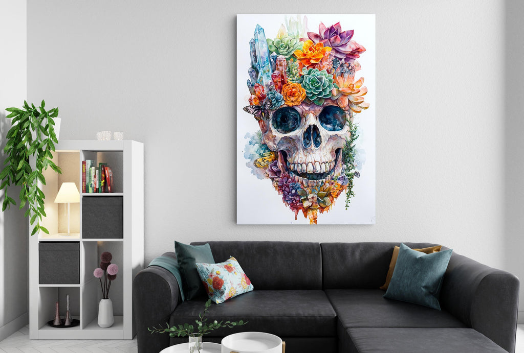 a large, colorful painting of a skull adorned with flowers and plants, hanging on a wall above a black couch in a living room setting.