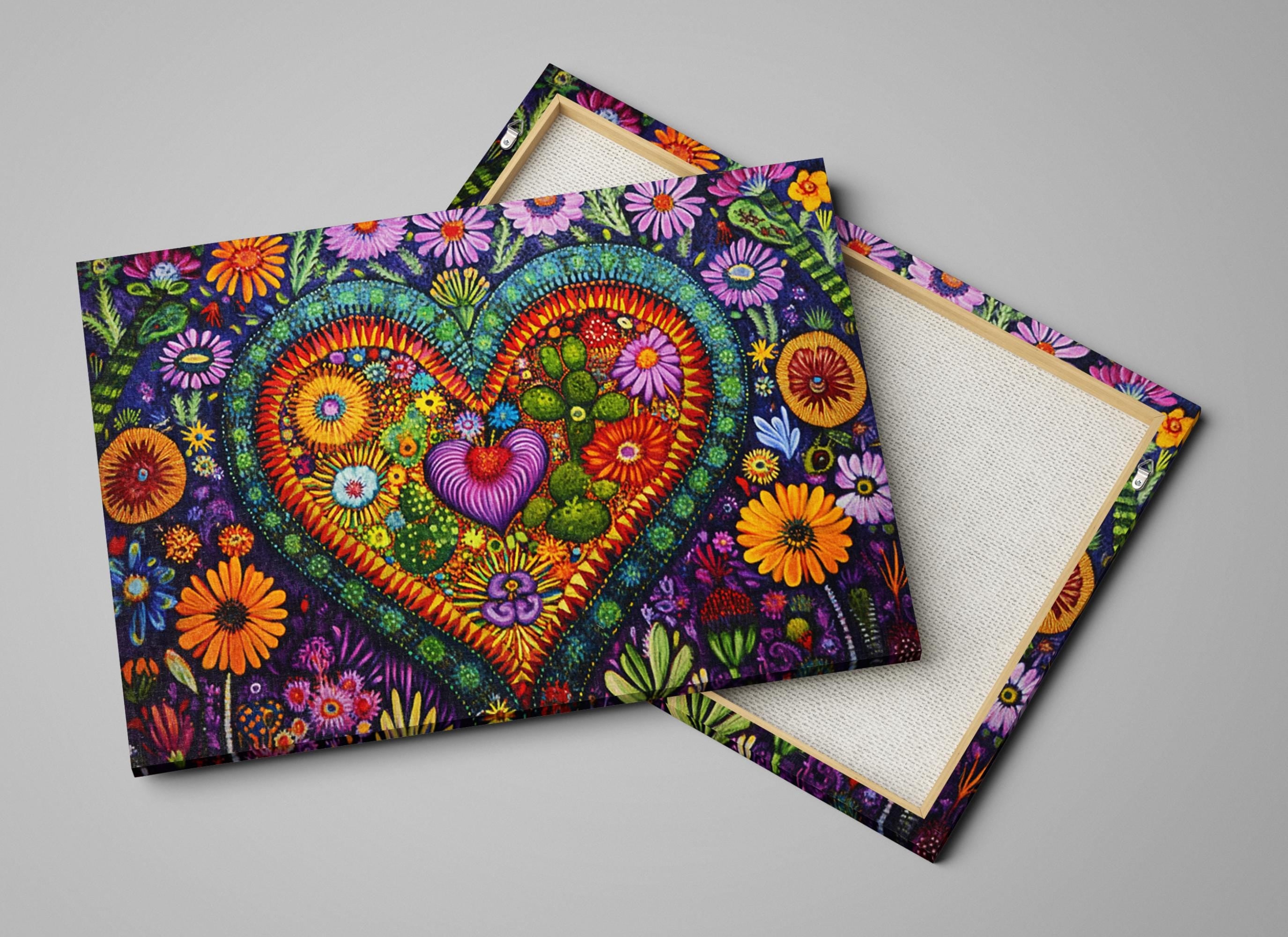 a couple of colorful paintings on a white surface