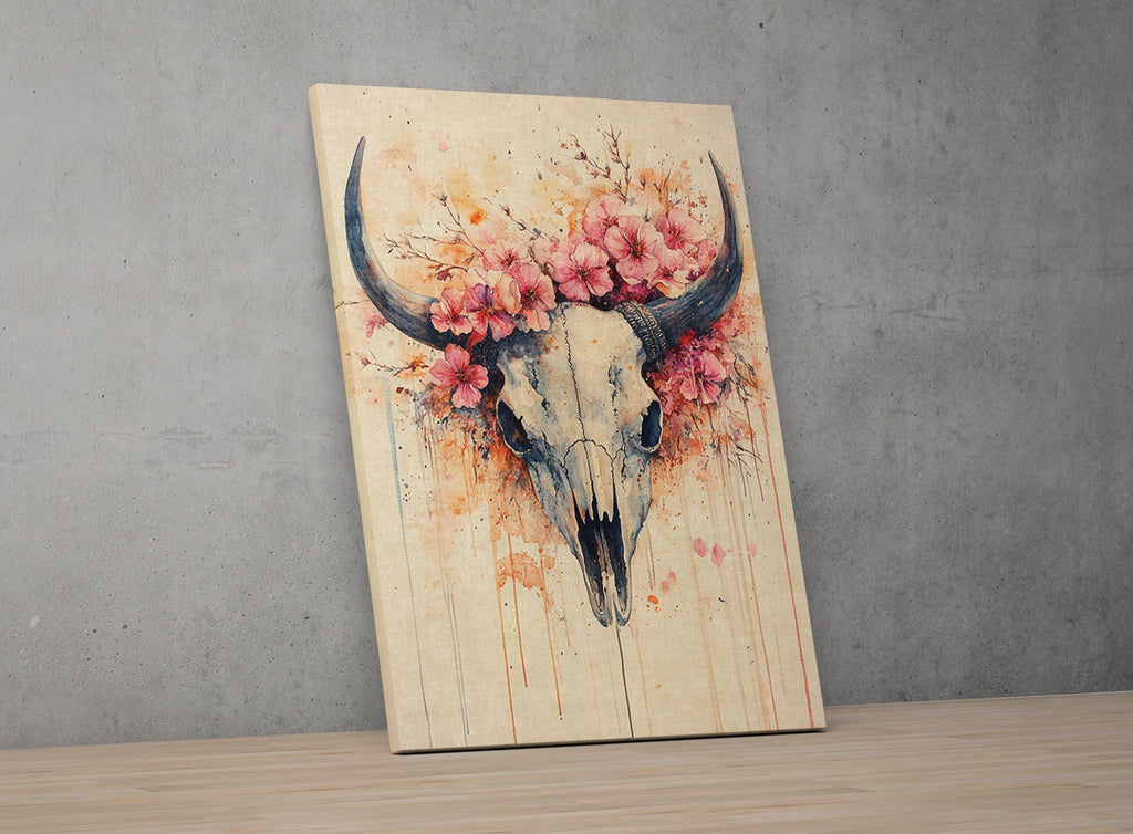a skull with large horns and a floral wreath around it, set against a gray wall.