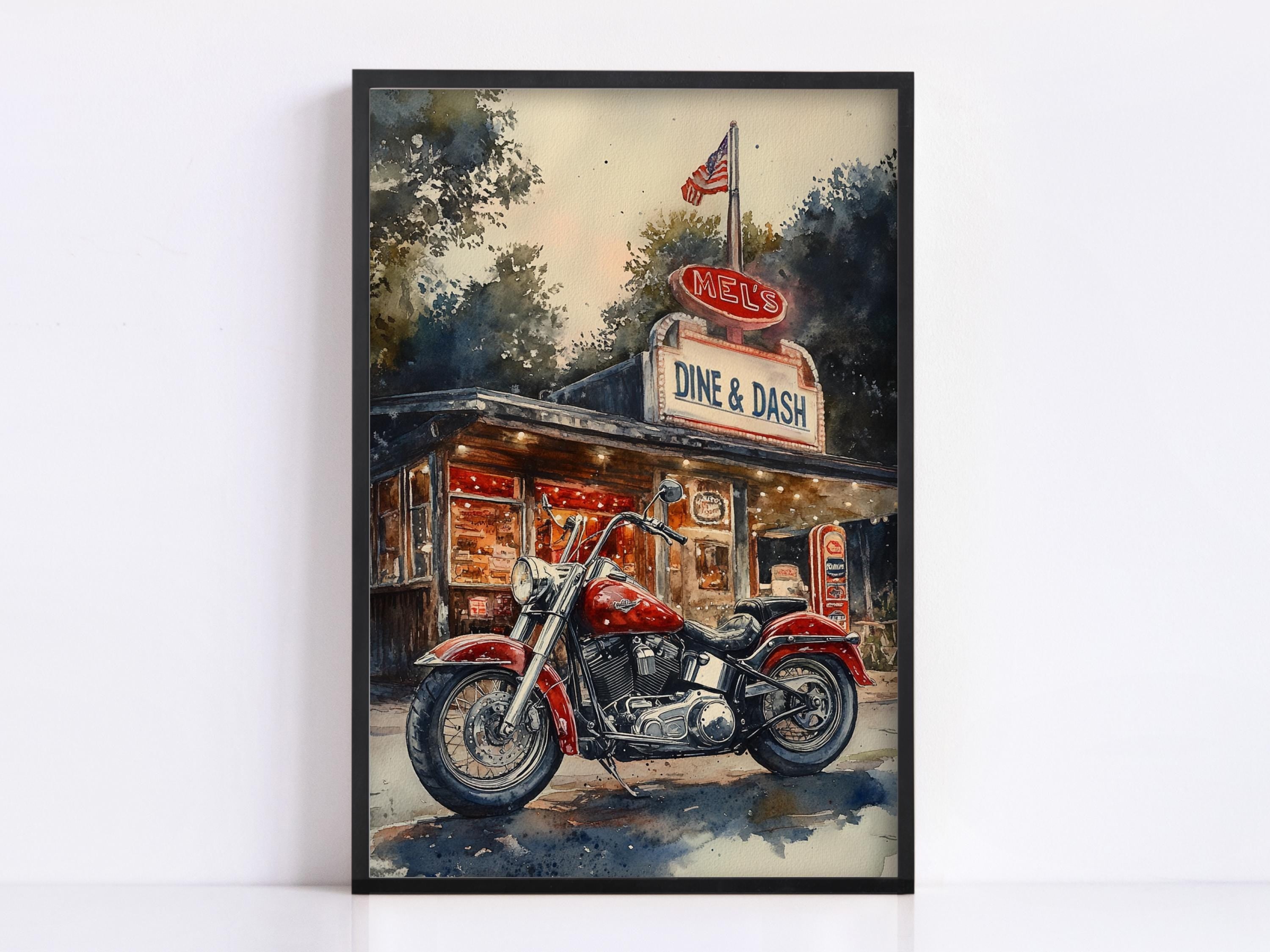 A framed painting depicting a red motorcycle parked in front of a diner called "Mels Dine & Dash".