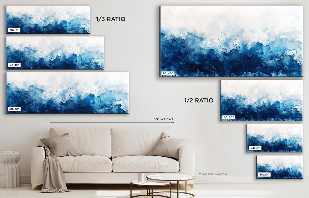 a living room with a couch and paintings on the wall
