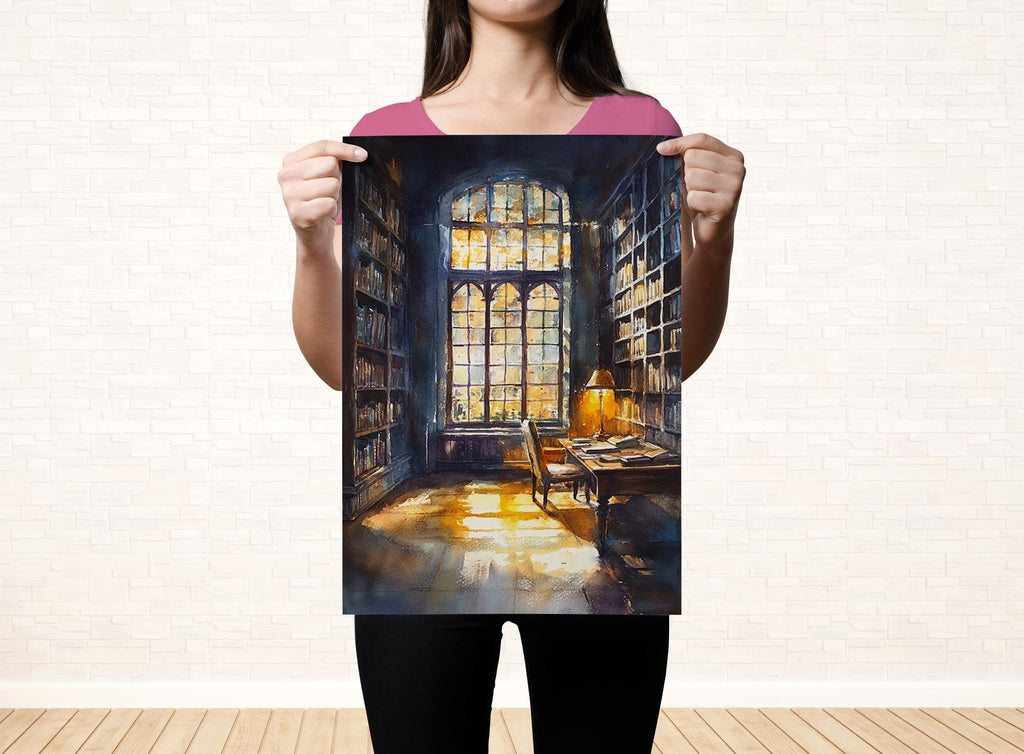 A woman holds up a framed painting depicting a serene library scene with a large window, bookshelves, and a desk with a lamp.