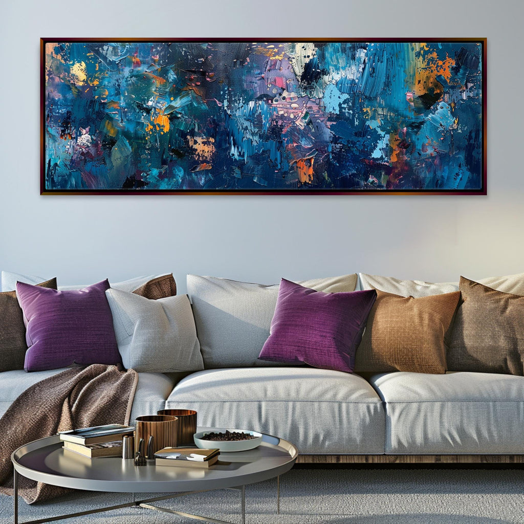 a living room with a couch and a painting on the wall