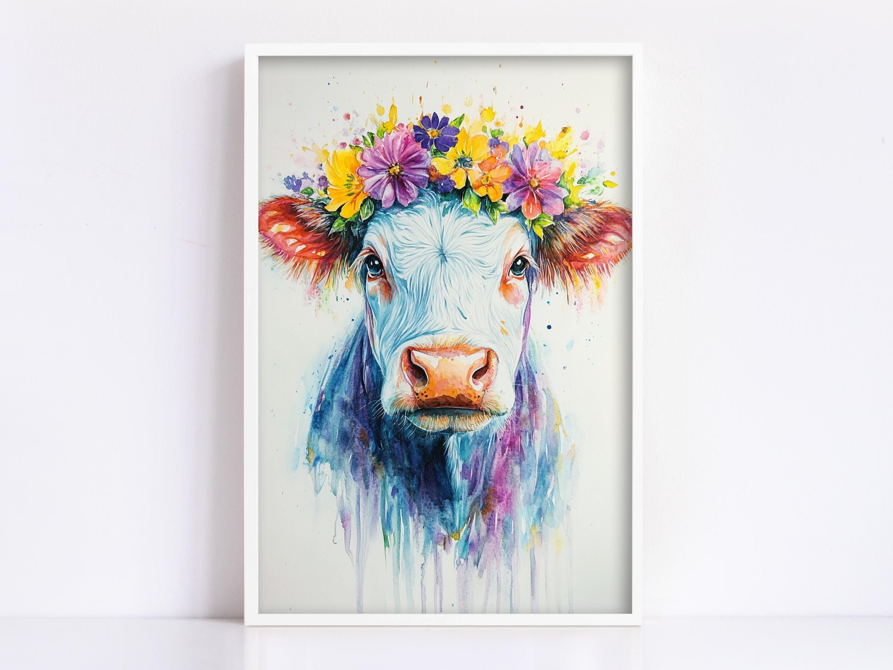 A framed painting of a cow with a colorful flower crown on its head.