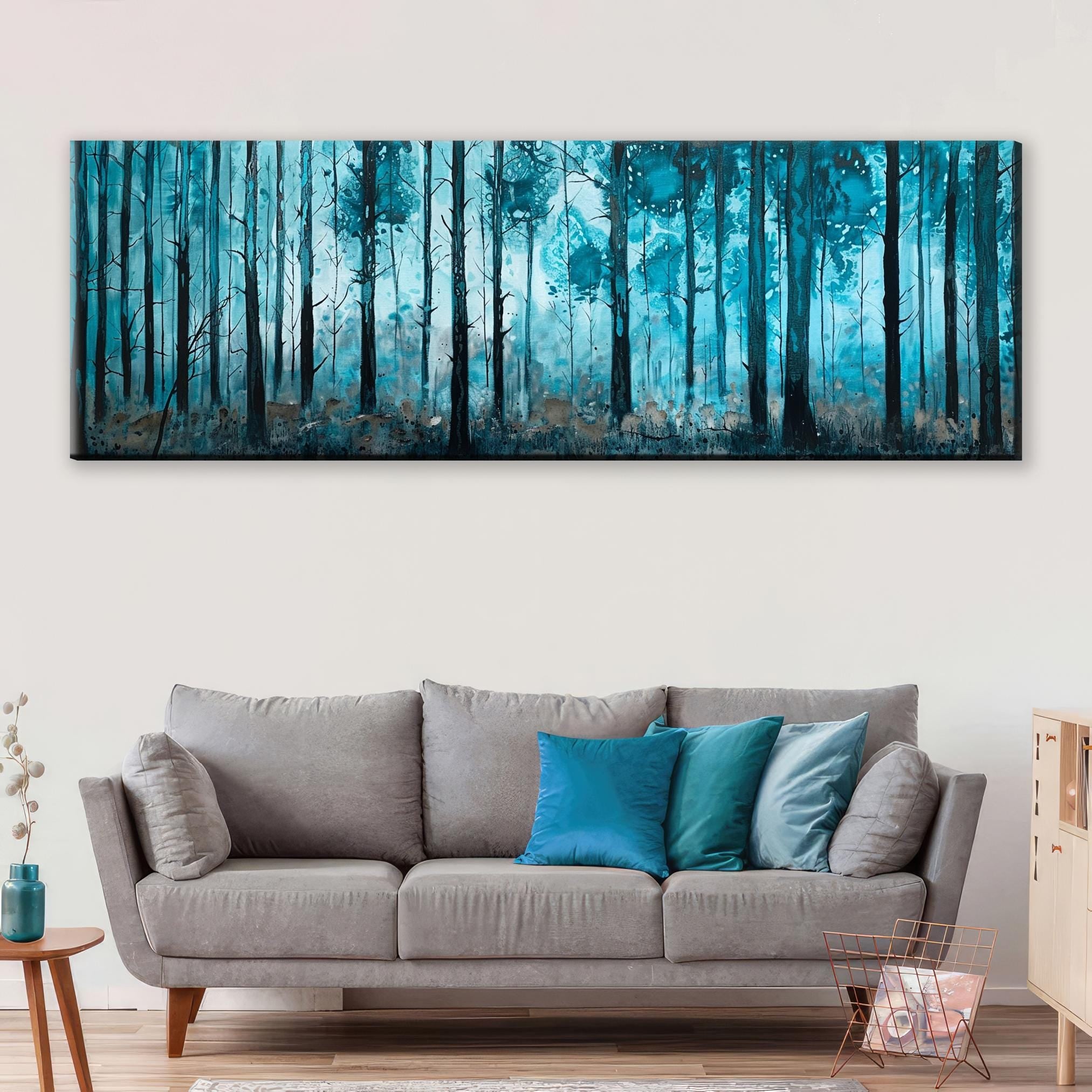 a living room with a couch and a painting on the wall