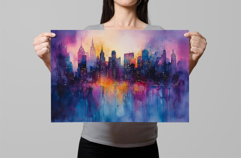 A woman holds up a vibrant watercolor painting depicting a cityscape with colorful buildings and a glowing skyline at night.