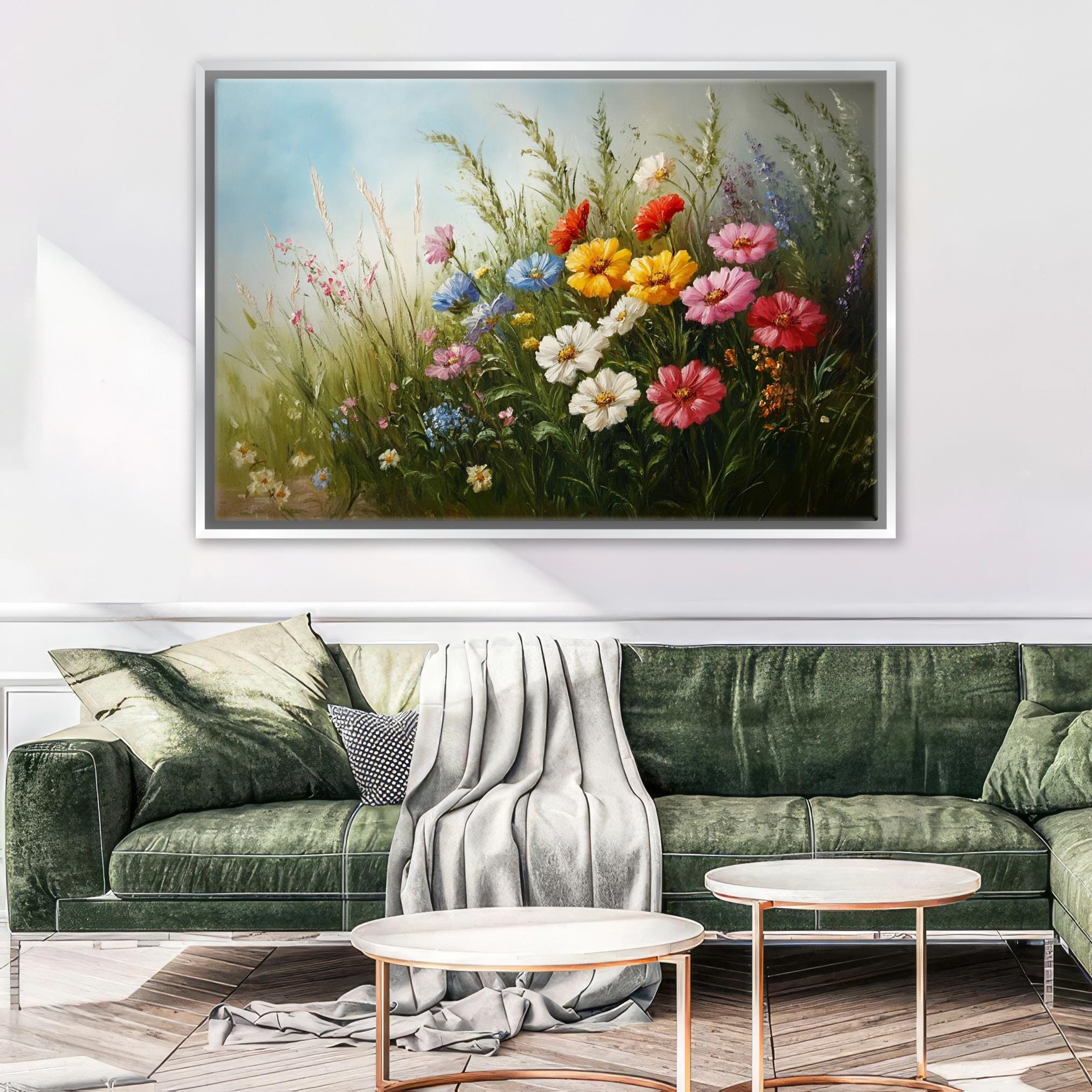 a living room with a green couch and a painting on the wall