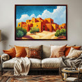 a living room with a couch and a painting on the wall