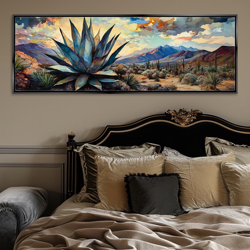 a painting of a desert scene on a wall above a bed