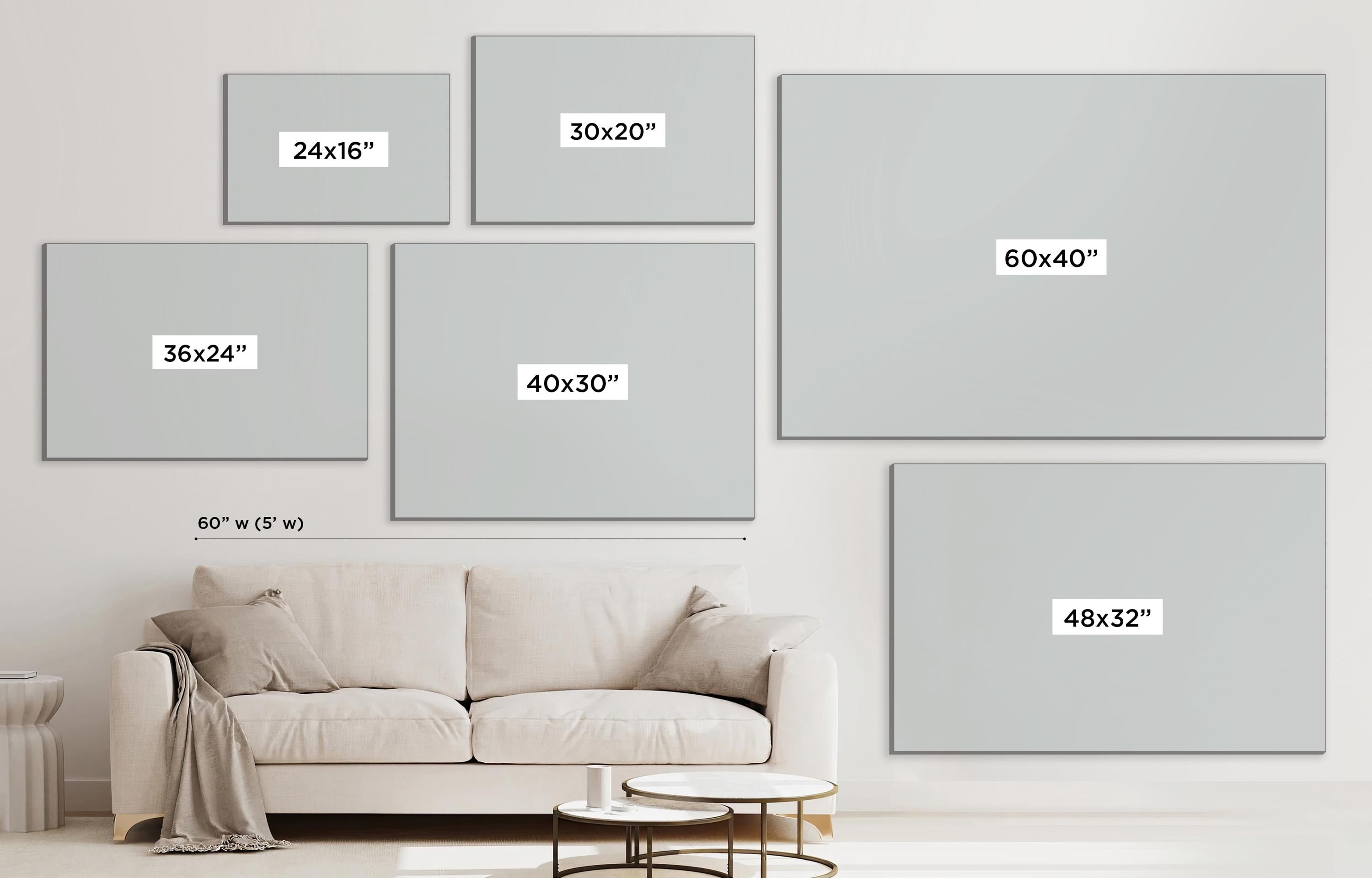 a living room with a white couch and a white wall