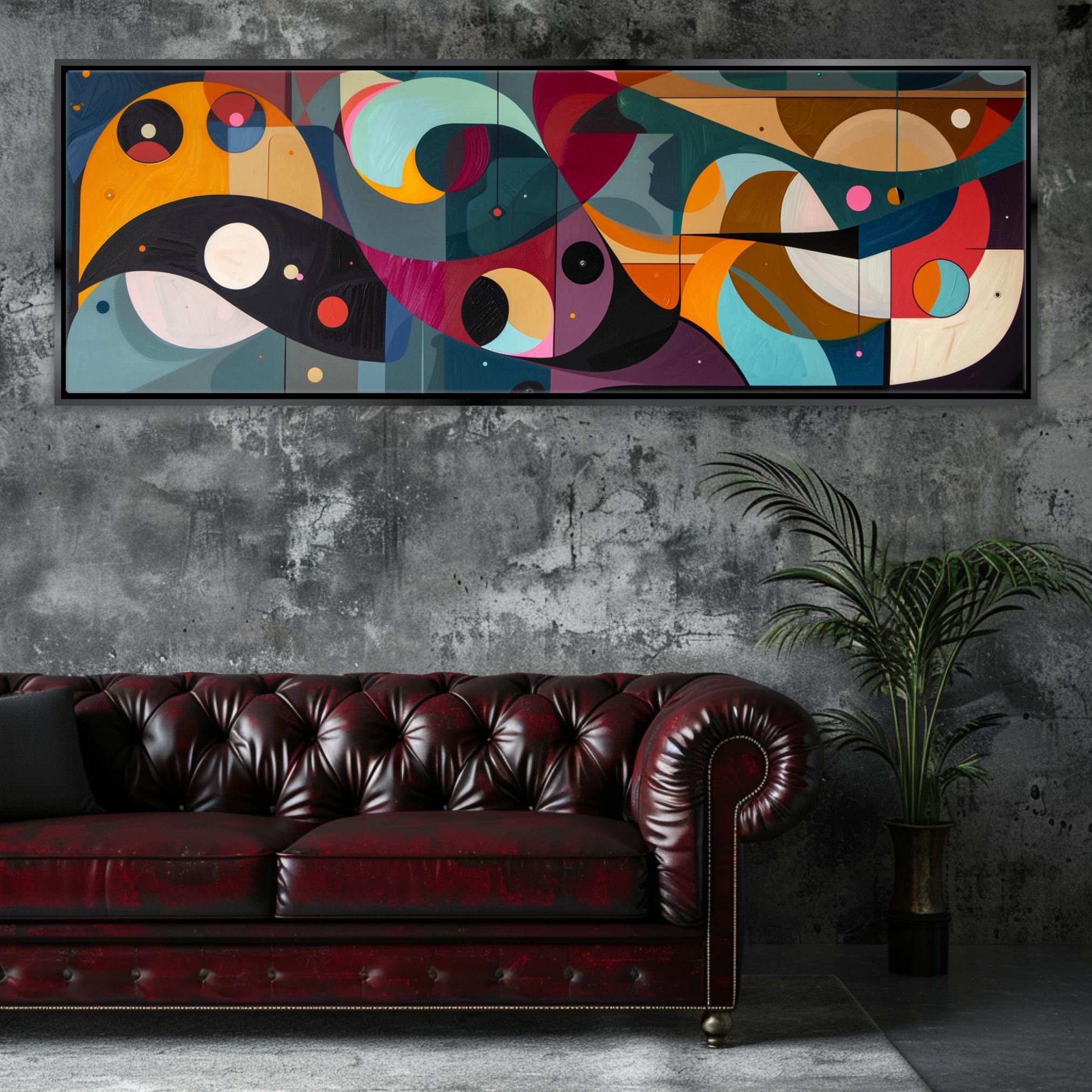 a living room with a couch and a painting on the wall