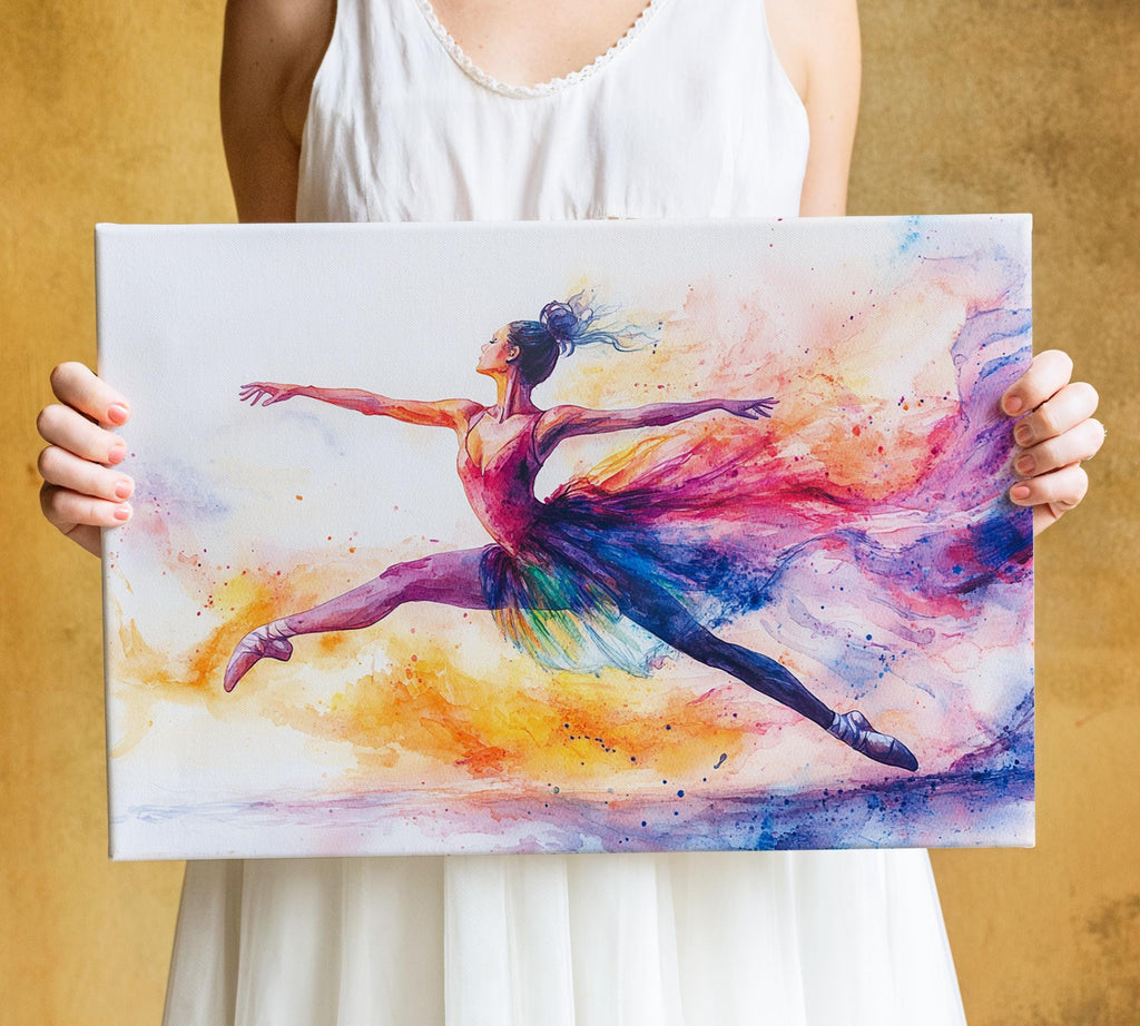A woman is holding a colorful painting of a ballerina in mid-jump, with vibrant hues of pink, blue, and yellow creating a dynamic and energetic scene.