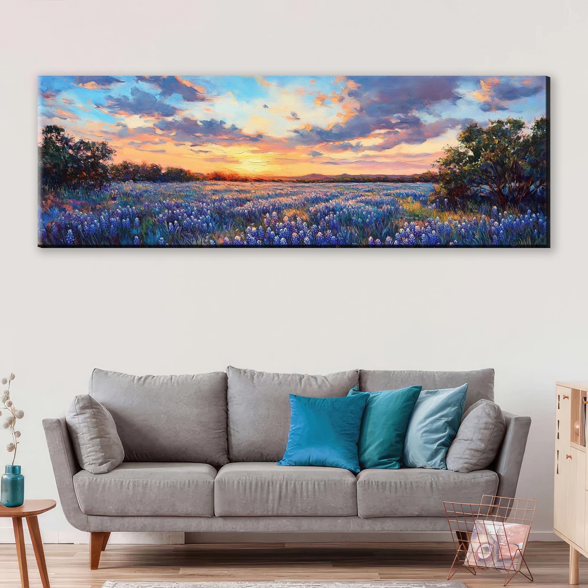 a living room with a couch and a painting on the wall
