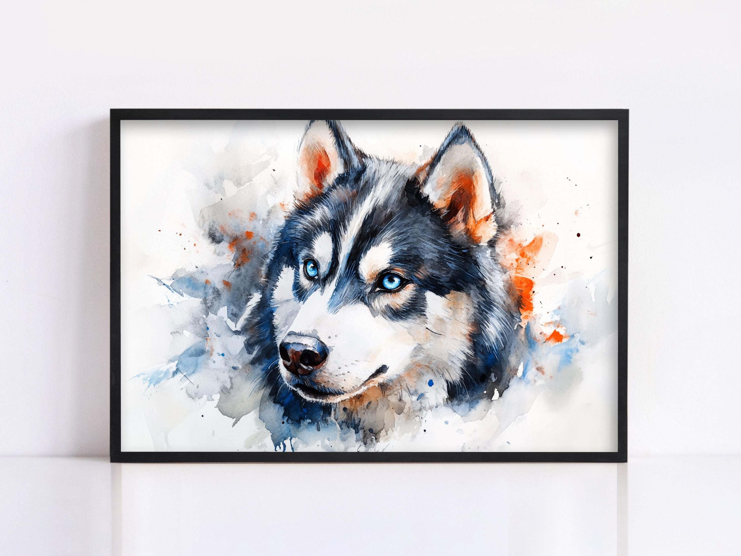 A framed watercolor painting depicting a close-up portrait of a husky dog with striking blue eyes and a black and white coat.