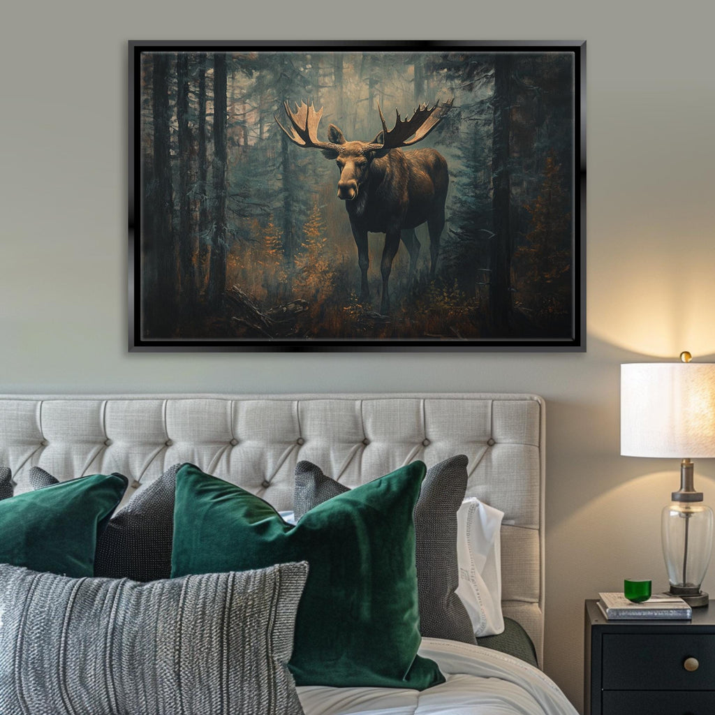 a painting of a moose in a forest hangs above a bed