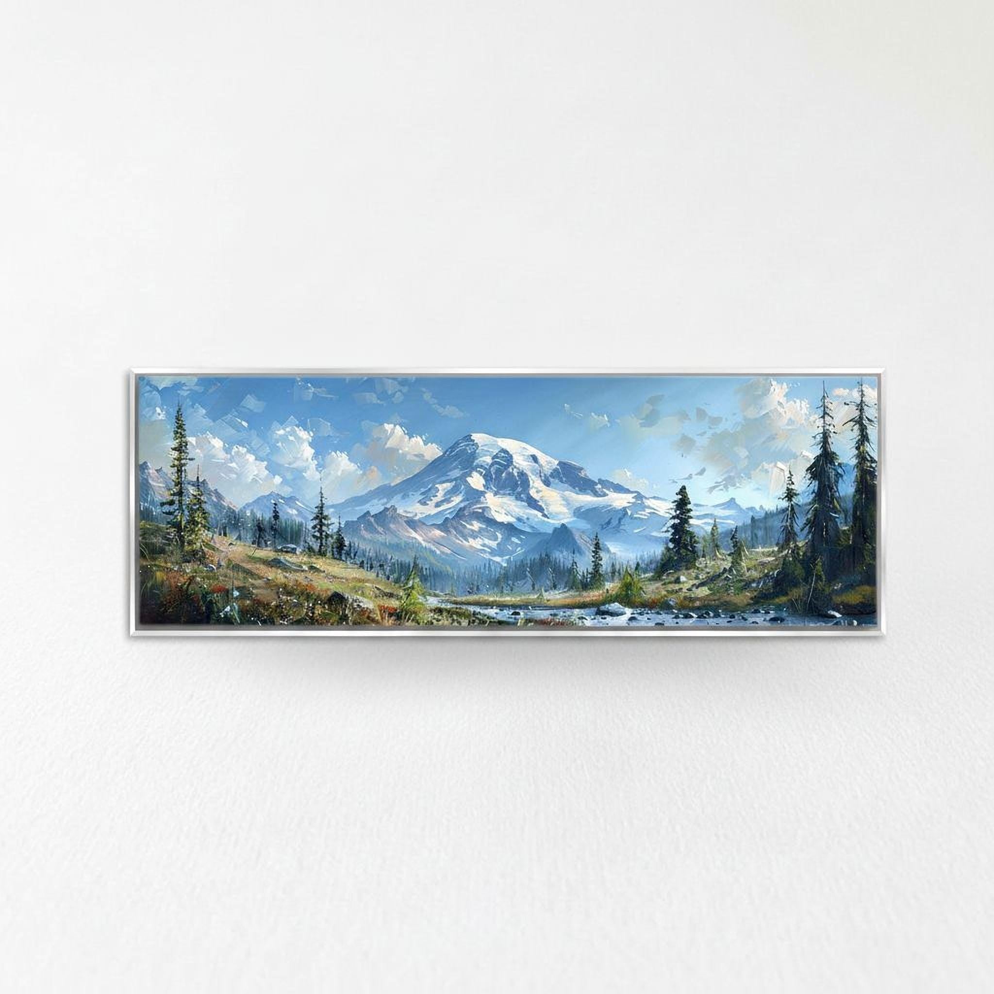 A framed landscape painting depicting a majestic mountain range with snow-capped peaks, surrounded by a forested area and a river flowing through the valley.