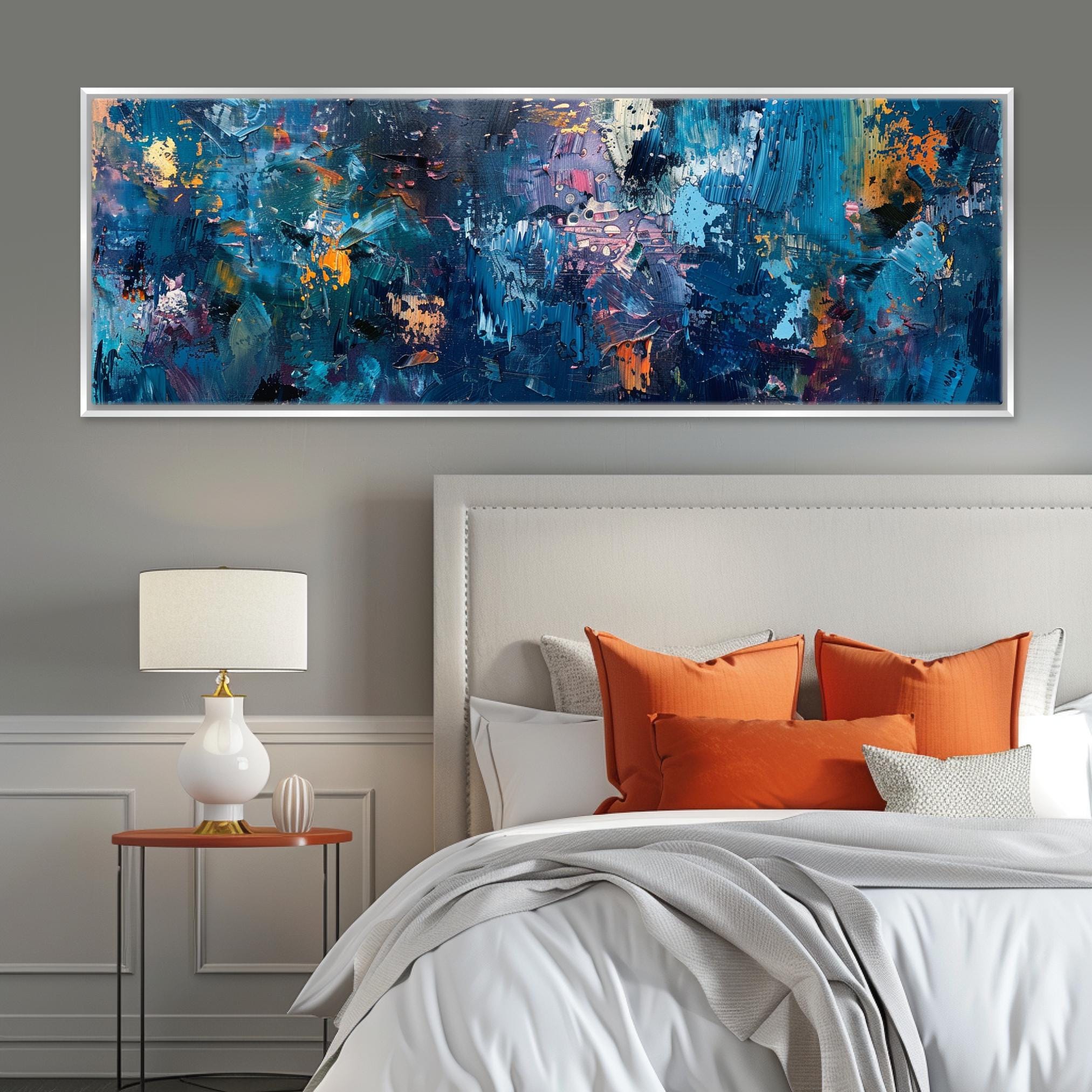 a bedroom with a large painting on the wall above the bed