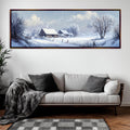 a living room with a couch and a painting on the wall