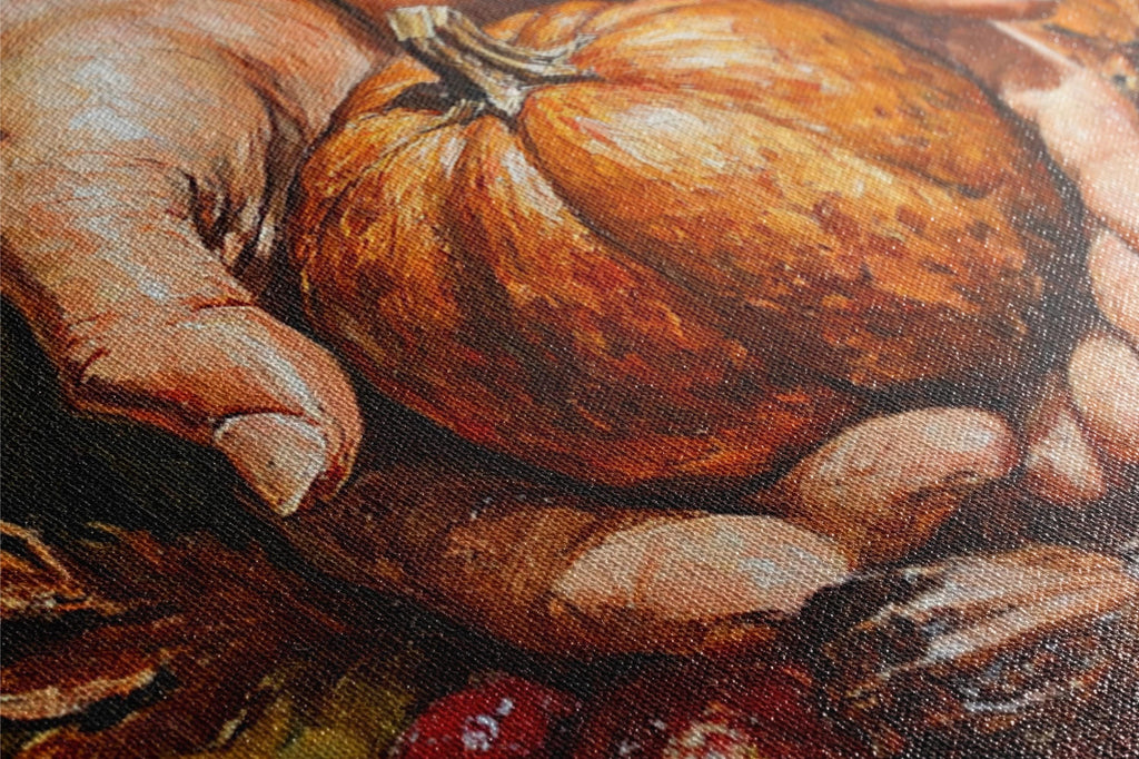 A close-up of a hand holding a large orange pumpkin, with a blurred background that appears to be a painting or canvas.
