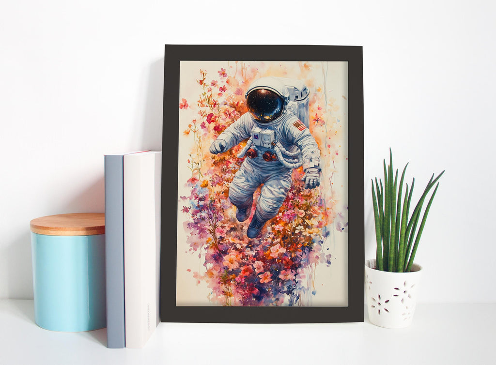 a framed painting of an astronaut floating in a colorful, floral-filled space, with a potted plant and books on a shelf in the background.