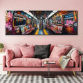 a pink couch in a living room with a painting on the wall