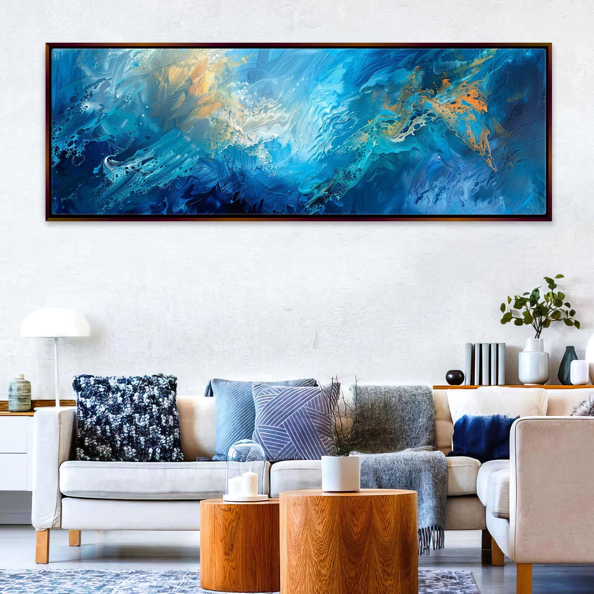 a living room filled with furniture and a painting on the wall