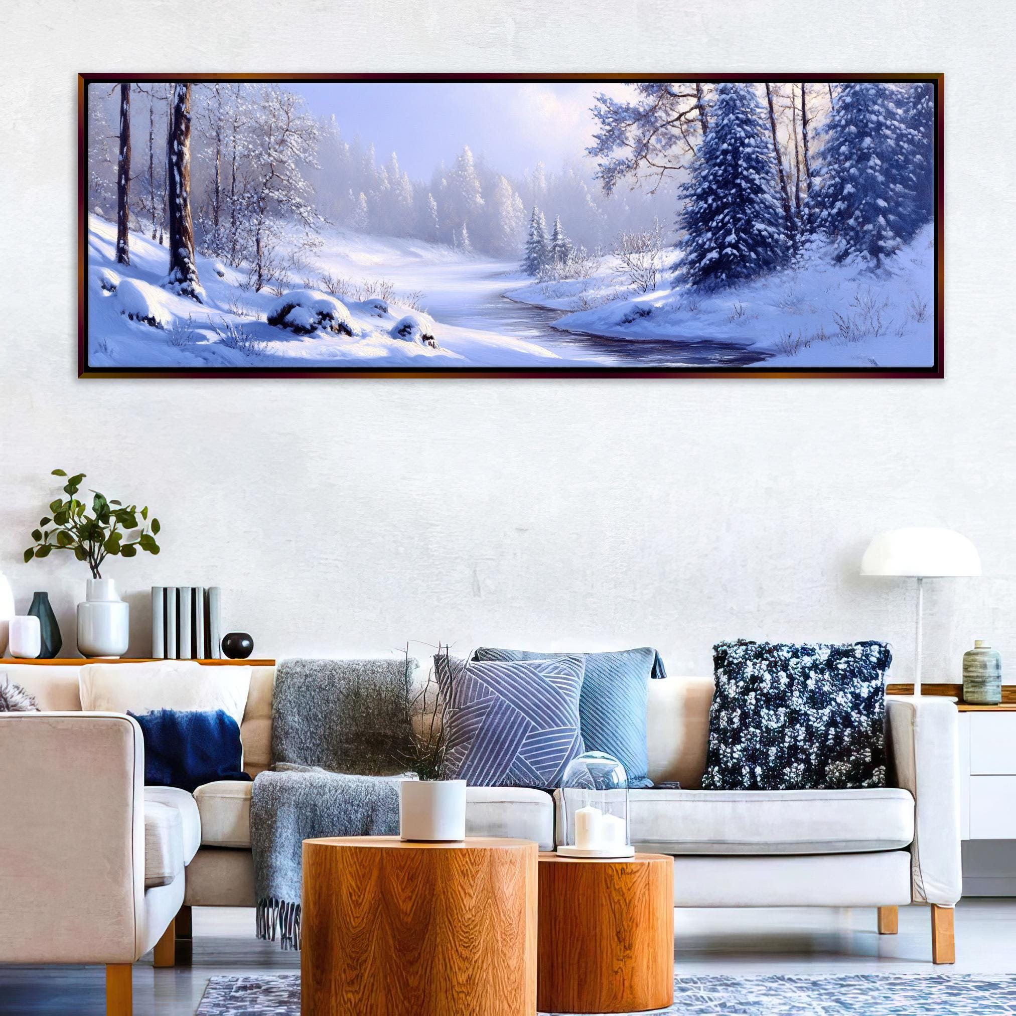 a living room with a couch and a painting on the wall